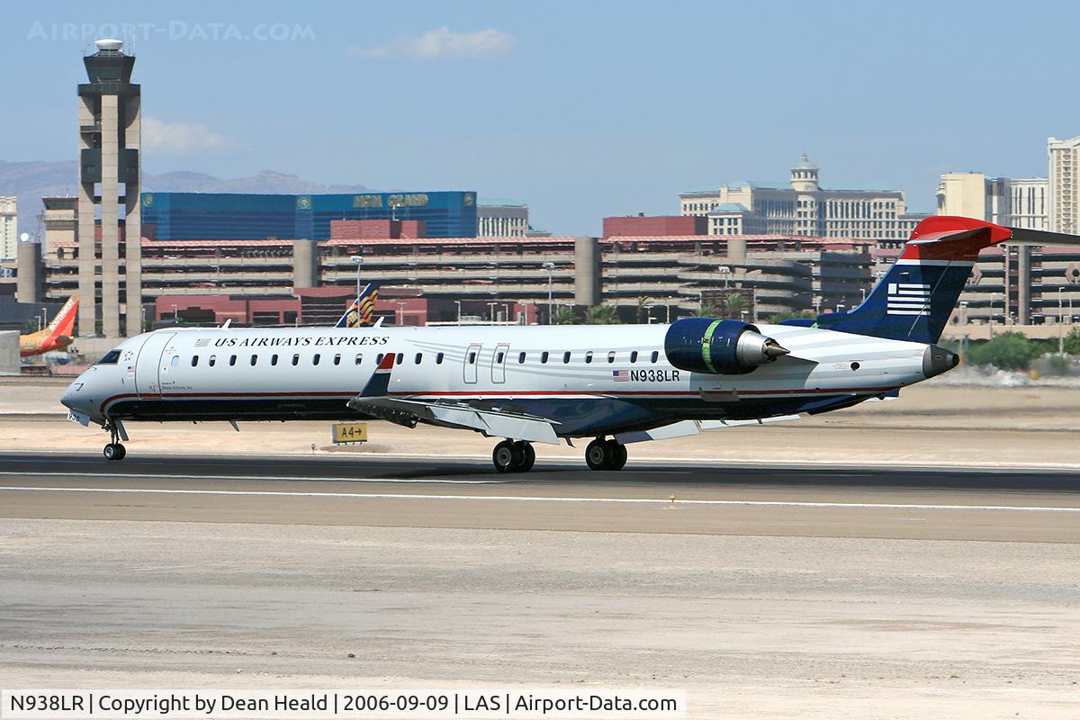 N938LR, 2005 Bombardier CRJ-900ER (CL-600-2D24) C/N 15038, US Airways Express (Mesa Airlines) N938LR (FLT ASH2969) from Los Angeles Int'l (KLAX) rolling out after landing on RWY 25L.