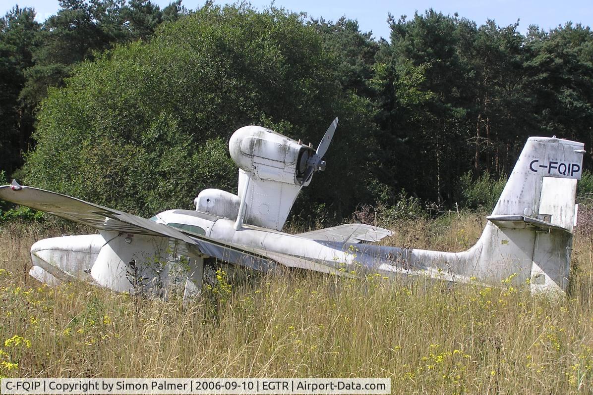 C-FQIP, 1975 Lake LA-4-200 Buccaneer C/N 679, Lake LA-4 abandoned in the grass at Elstree