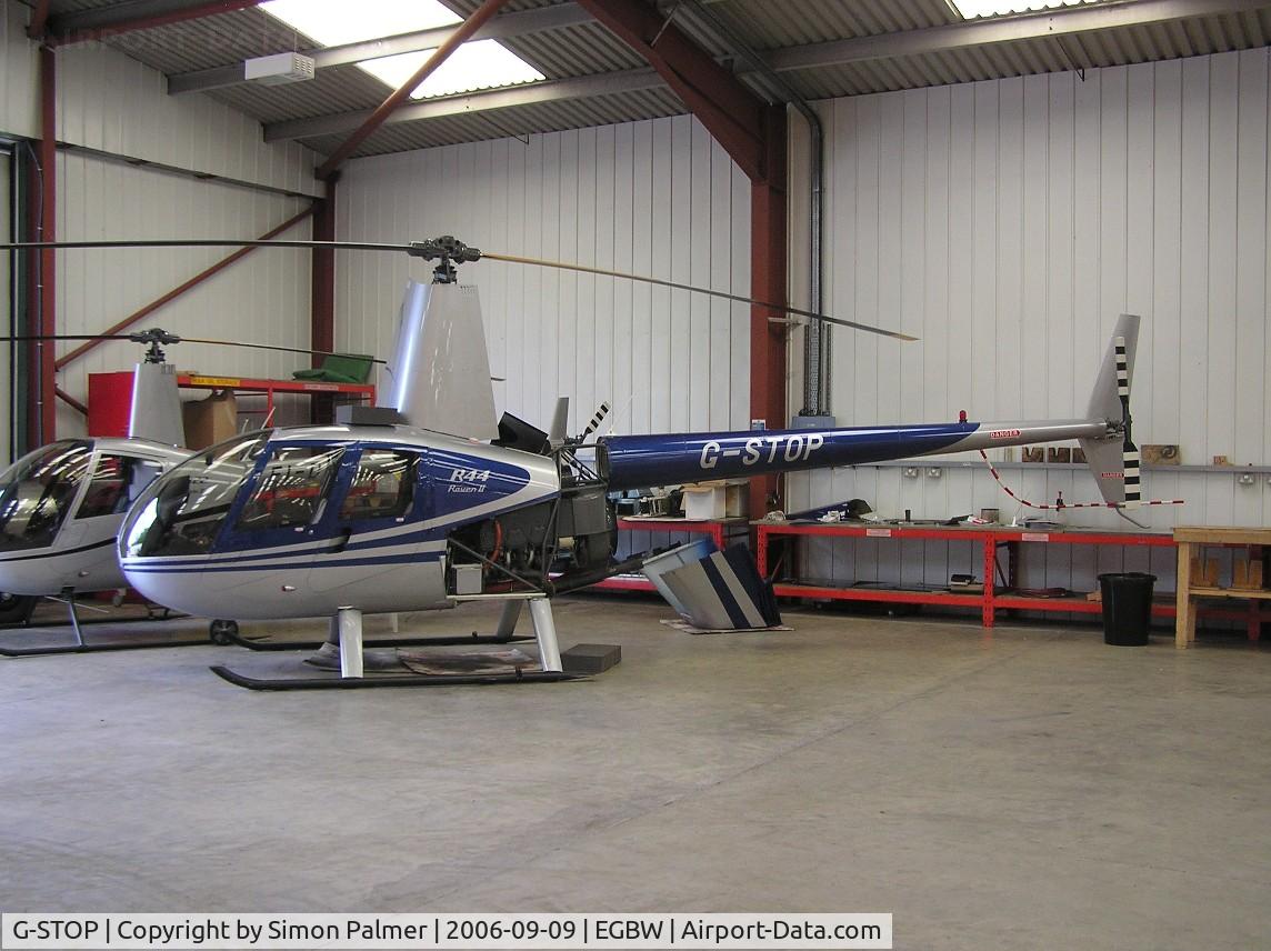 G-STOP, 2005 Robinson R44 II C/N 10852, Robinson R44 in hangar at Wellesbourne