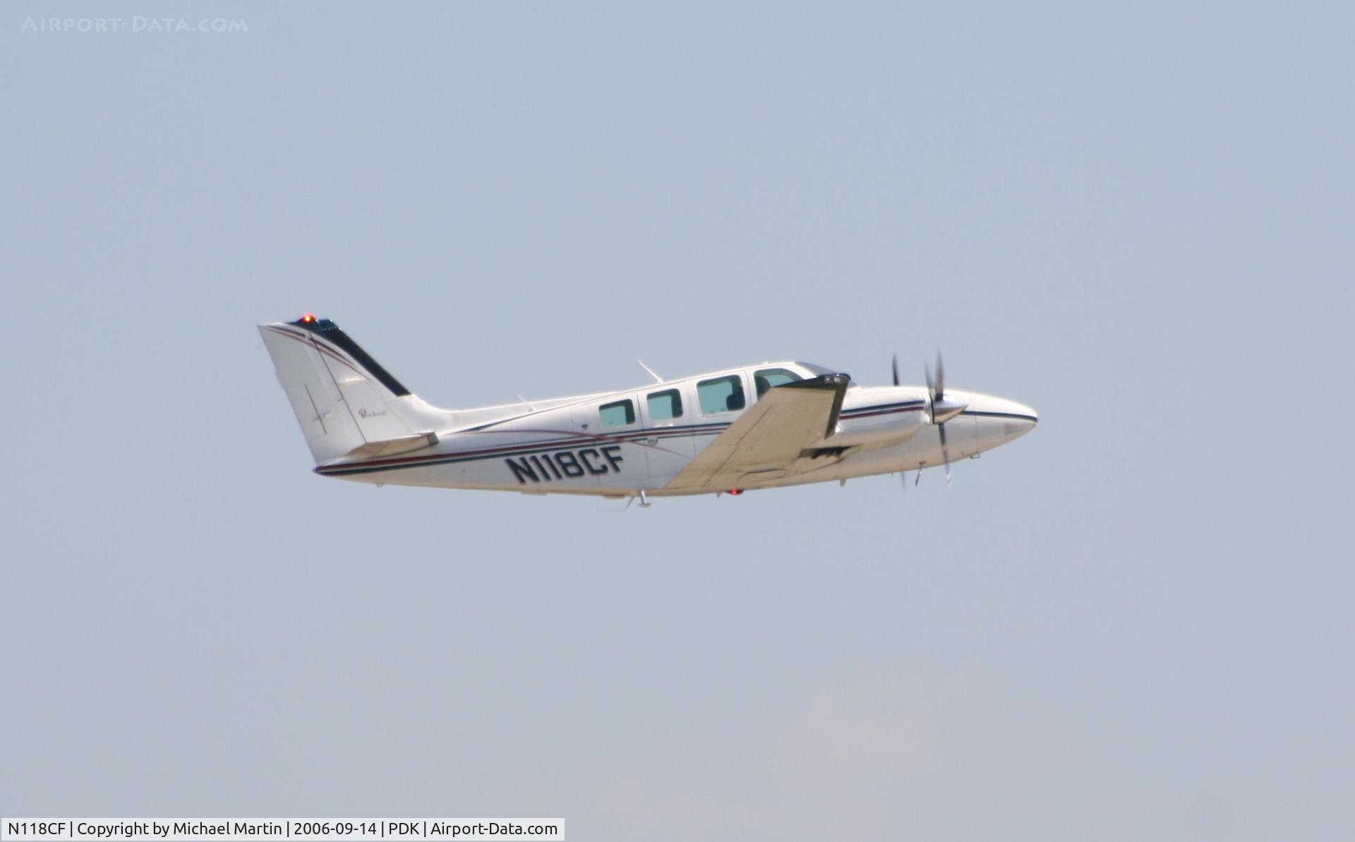 N118CF, 1978 Beech 58 Baron C/N TH-924, Departing 20L - Gear Up!