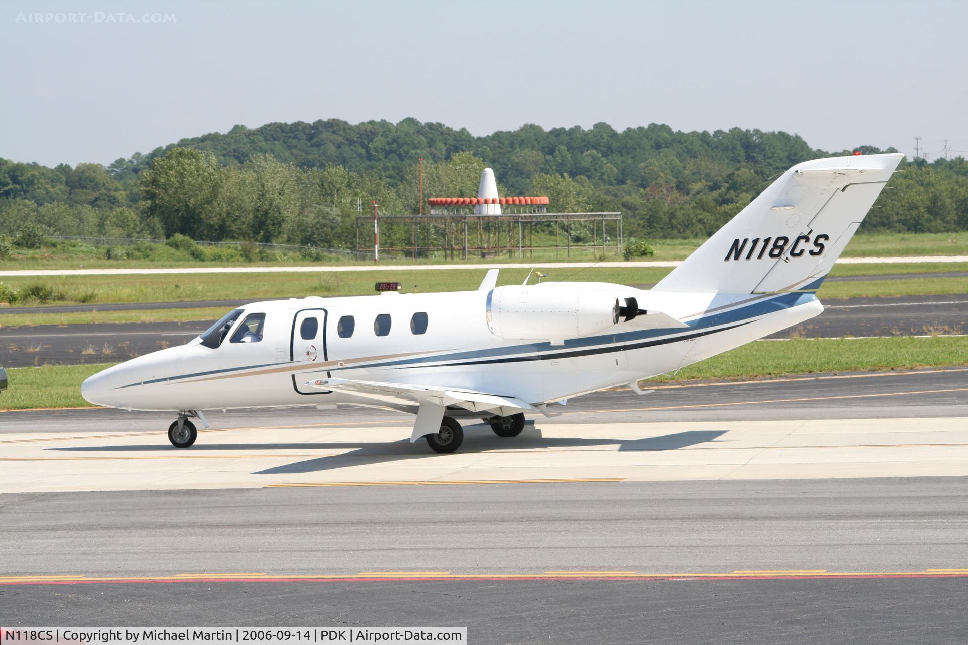 N118CS, 2001 Cessna 525 CitationJet C/N 525-0457, Taxing past Mercury Air Service