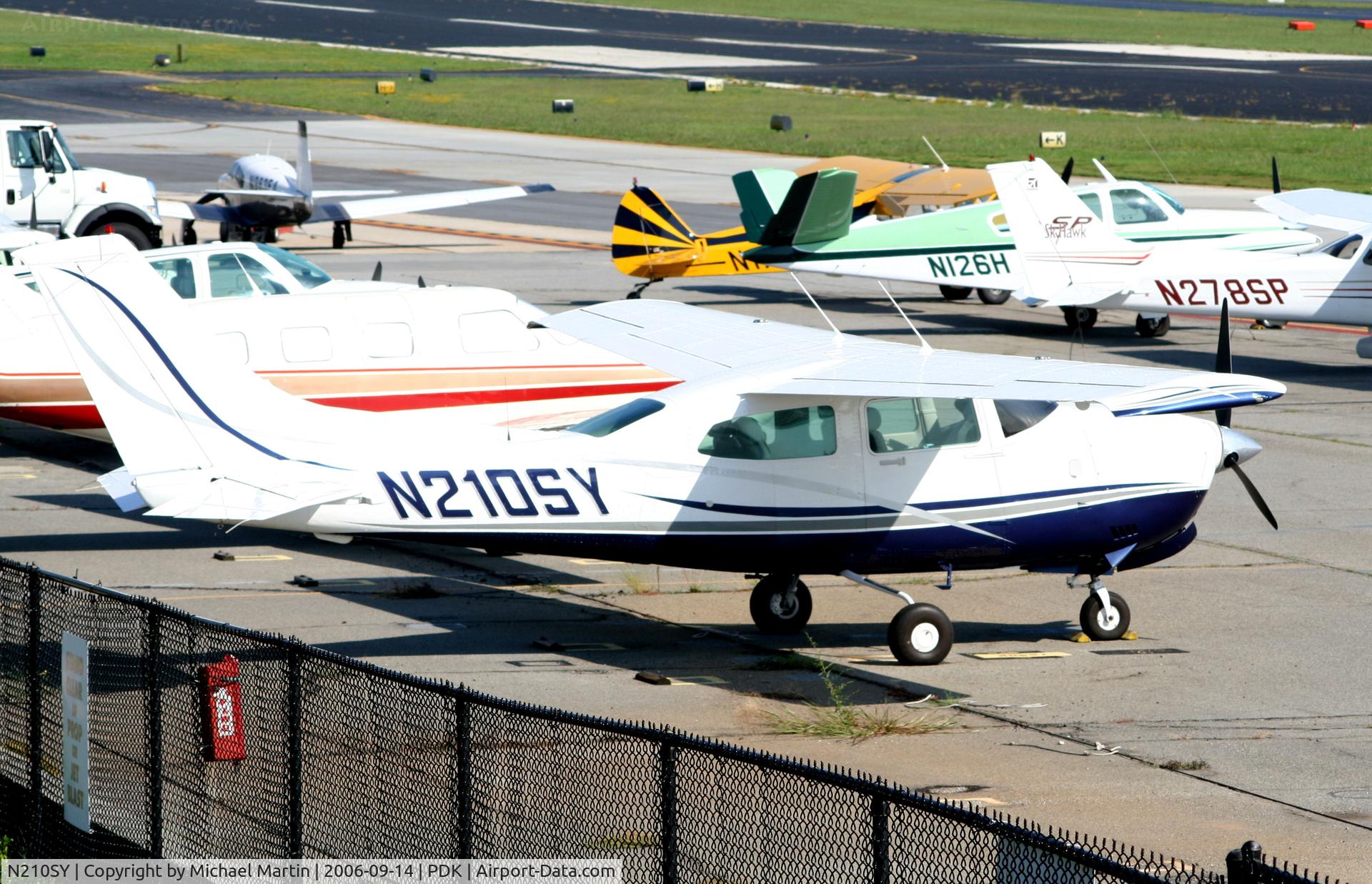 N210SY, 1979 Cessna 210N Centurion C/N 21063684, Tied Down @ Mercury Air Center with other A/C