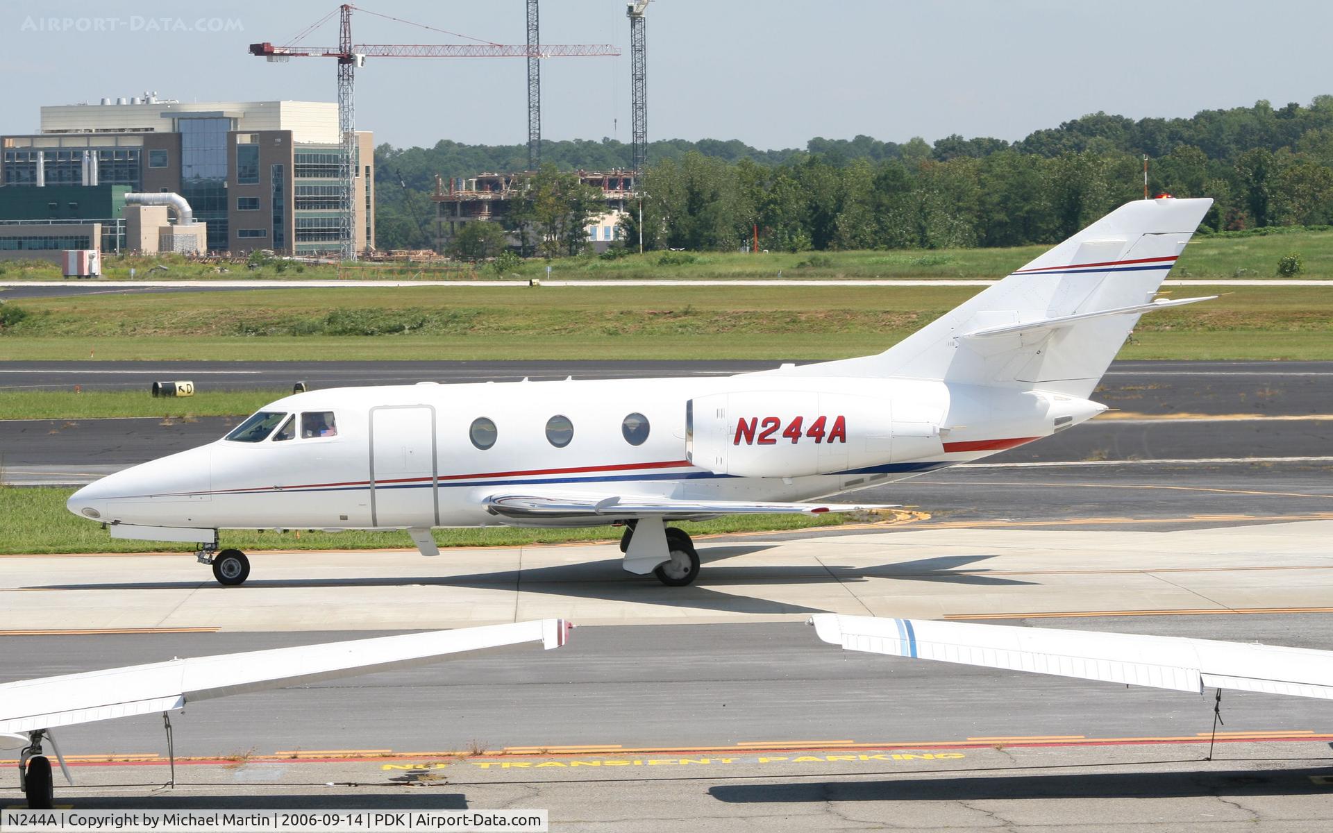 N244A, 1979 Dassault Falcon 10 C/N 145, Taxing to Epps Air Service