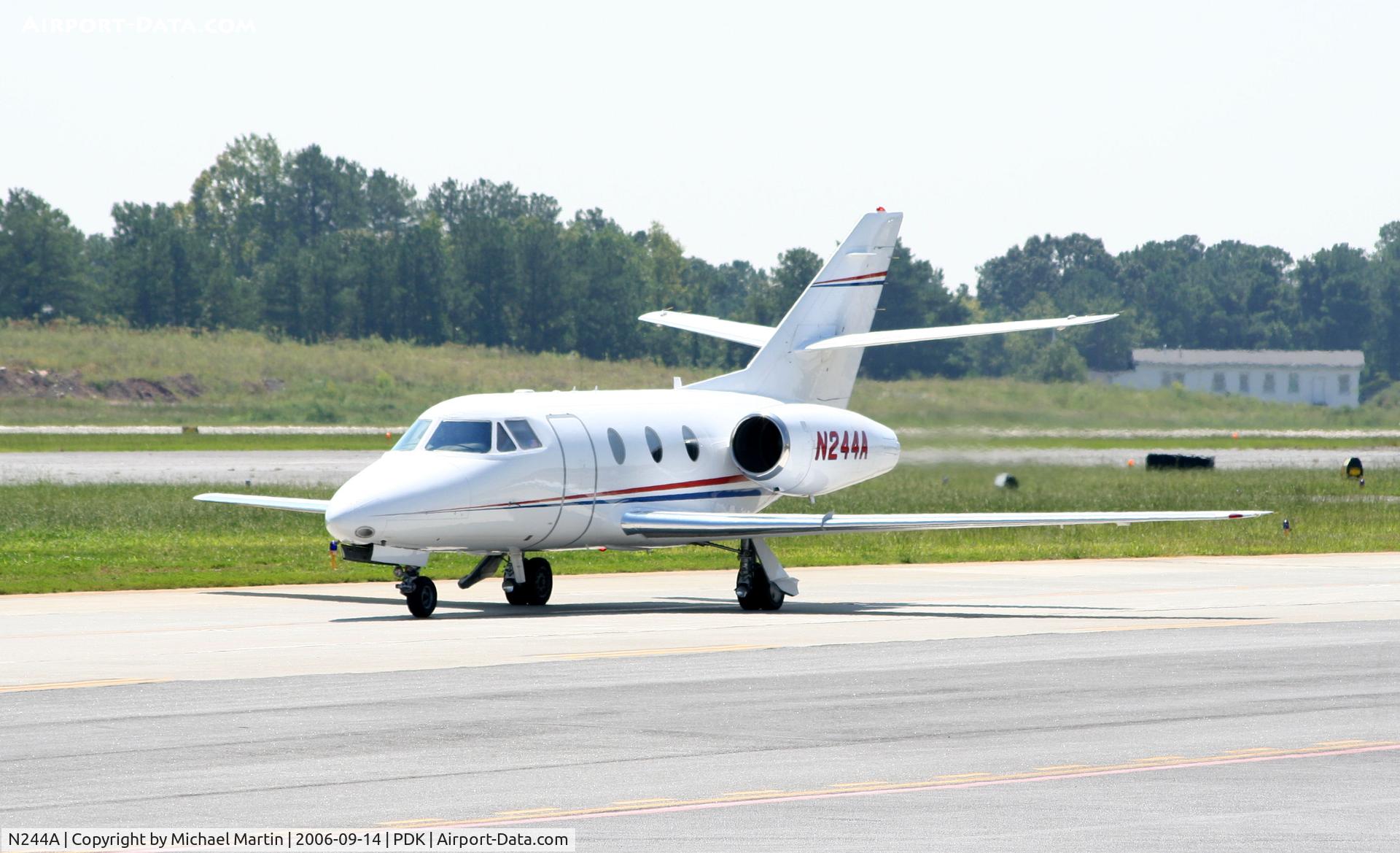 N244A, 1979 Dassault Falcon 10 C/N 145, Taxing to Epps Air Service