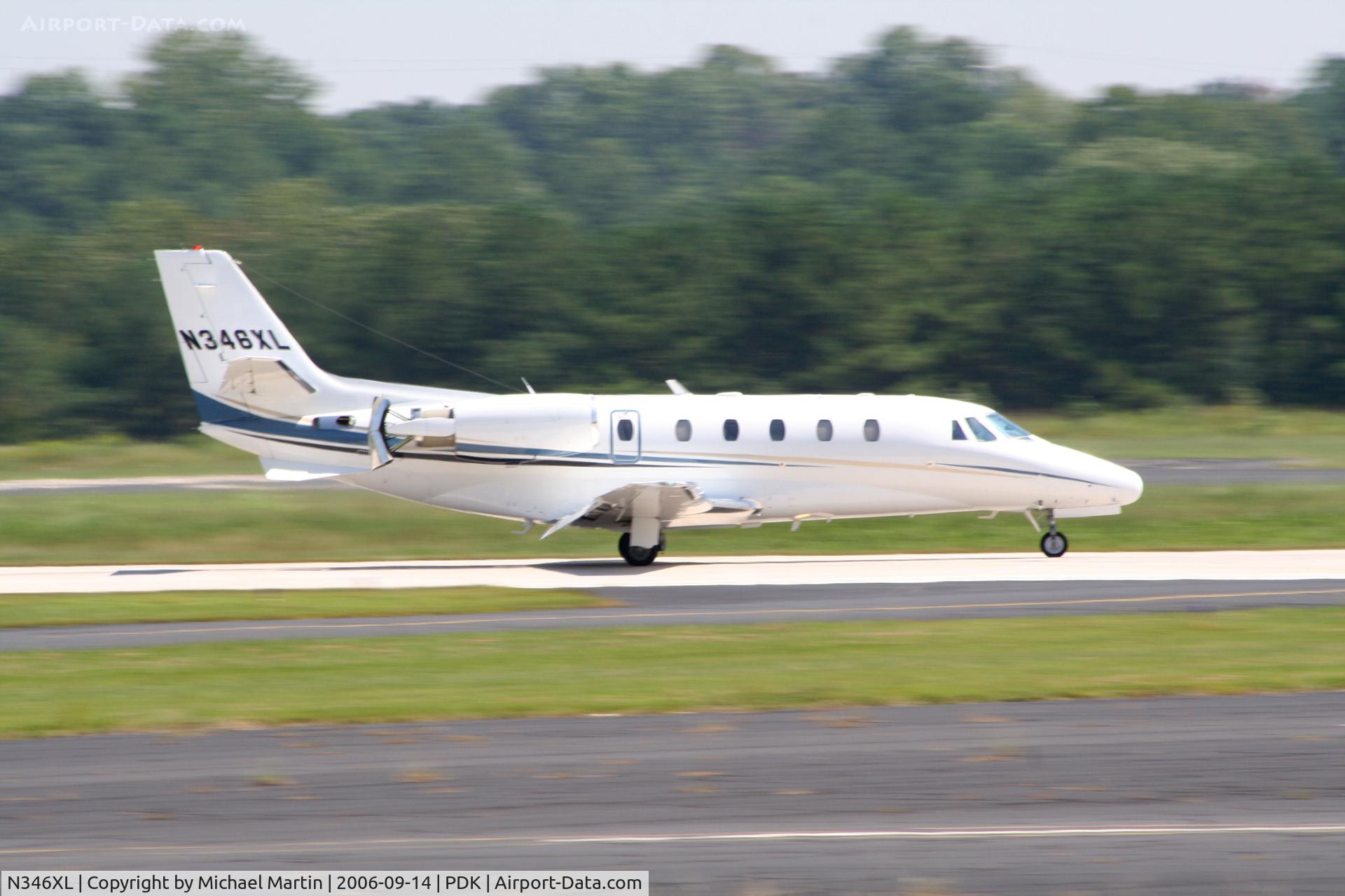 N346XL, 2003 Cessna 560XL C/N 560-5346, Landing Runway 20L