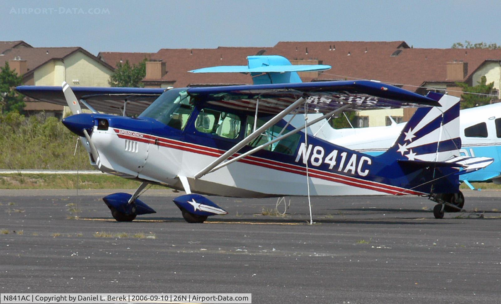 N841AC, 1999 American Champion 8KCAB Super Decathlon C/N 841-99, I wonder if the people living in the condos in the background are as much aviation enthusiasts as the owners of this sporty bird.