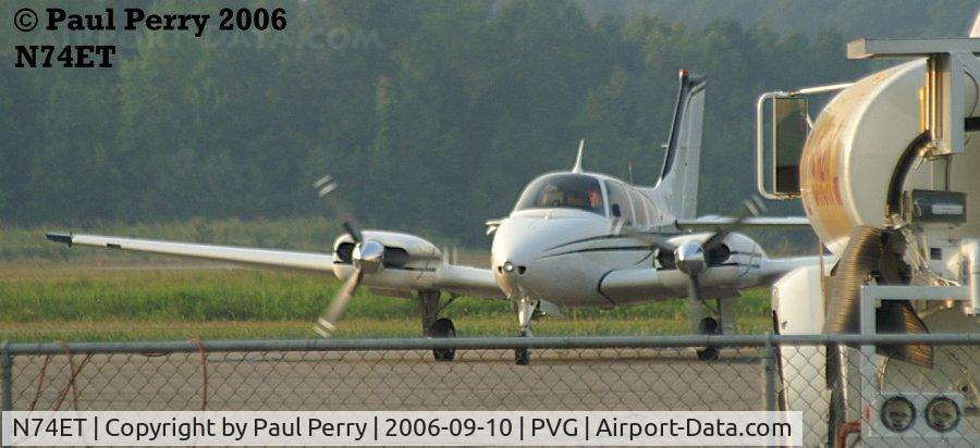 N74ET, 1964 Beech 95-B55 (T42A) Baron C/N TC-619, Blades whirling to a stop after having her tanks topped up