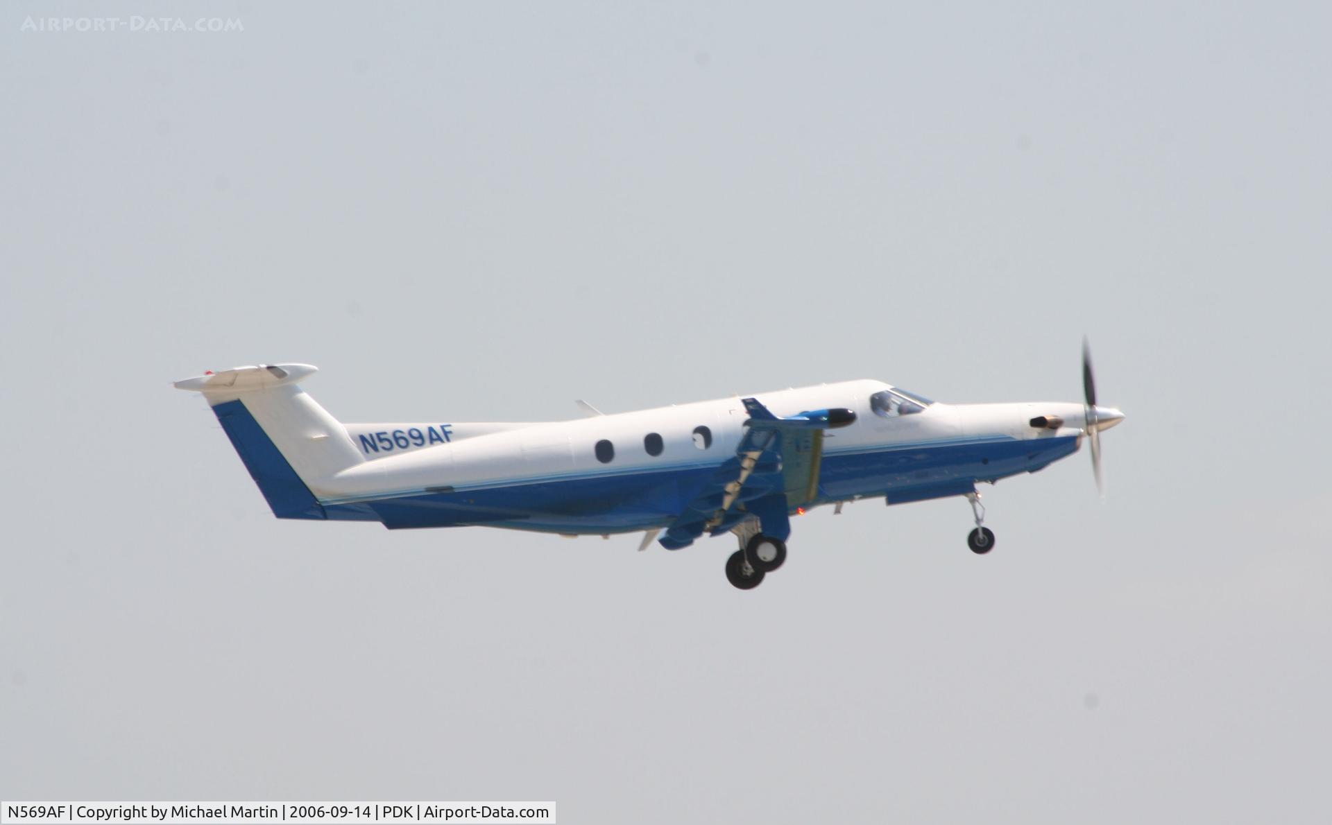 N569AF, 2004 Pilatus PC-12/45 C/N 569, Departing 20L - Gear Up!