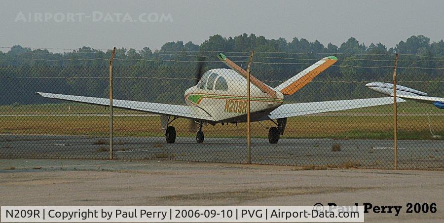N209R, 1962 Beech P35 Bonanza C/N D-6990, Leaving the parking apron, ready for flight