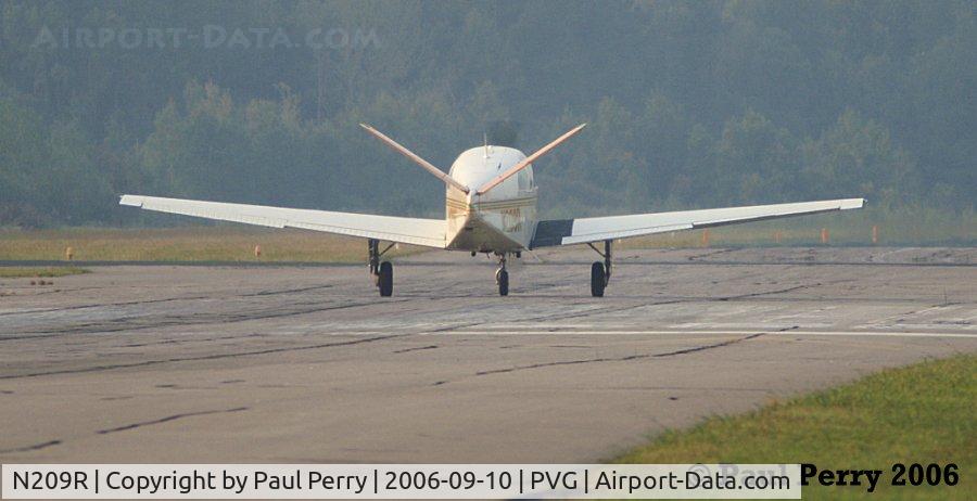 N209R, 1962 Beech P35 Bonanza C/N D-6990, And off she goes, accelerating down RWY 2