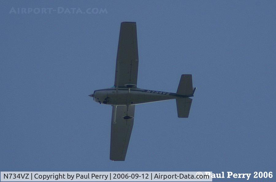 N734VZ, 1977 Cessna 172N C/N 17269161, Easing over Ahoskie, above the NAPA store