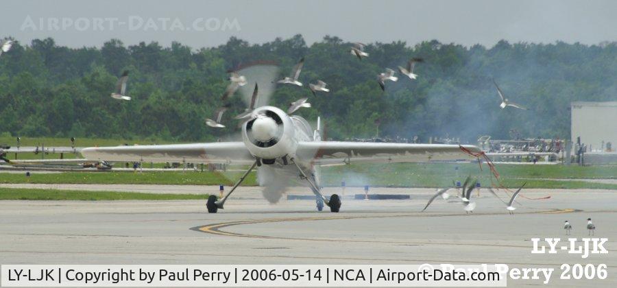 LY-LJK, Sukhoi Su-31 C/N 01-03, Taxiing back after his ribbon cut (note port wingtip), he clears some seagulls as well