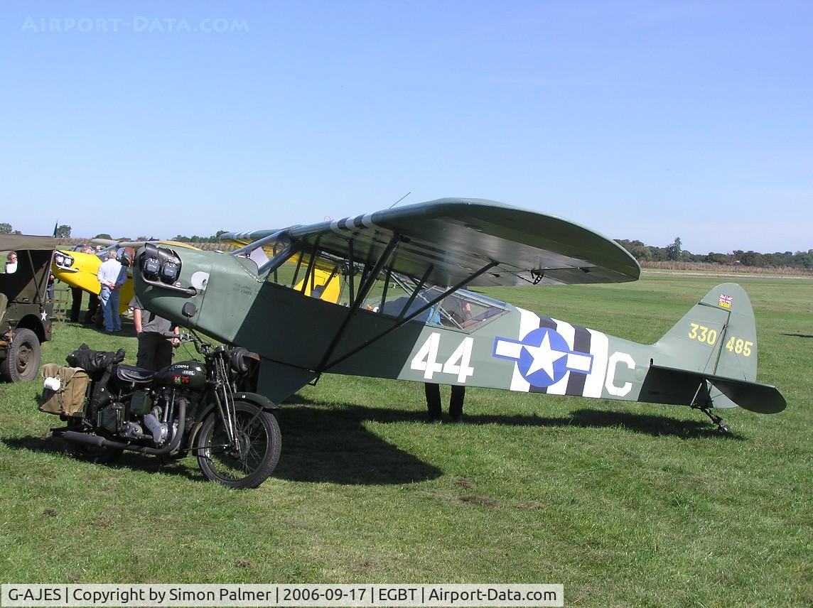 G-AJES, 1943 Piper L-4J Grasshopper (J3C-65D) C/N 11602, Piper Cub with vintage motorcycle at Turweston