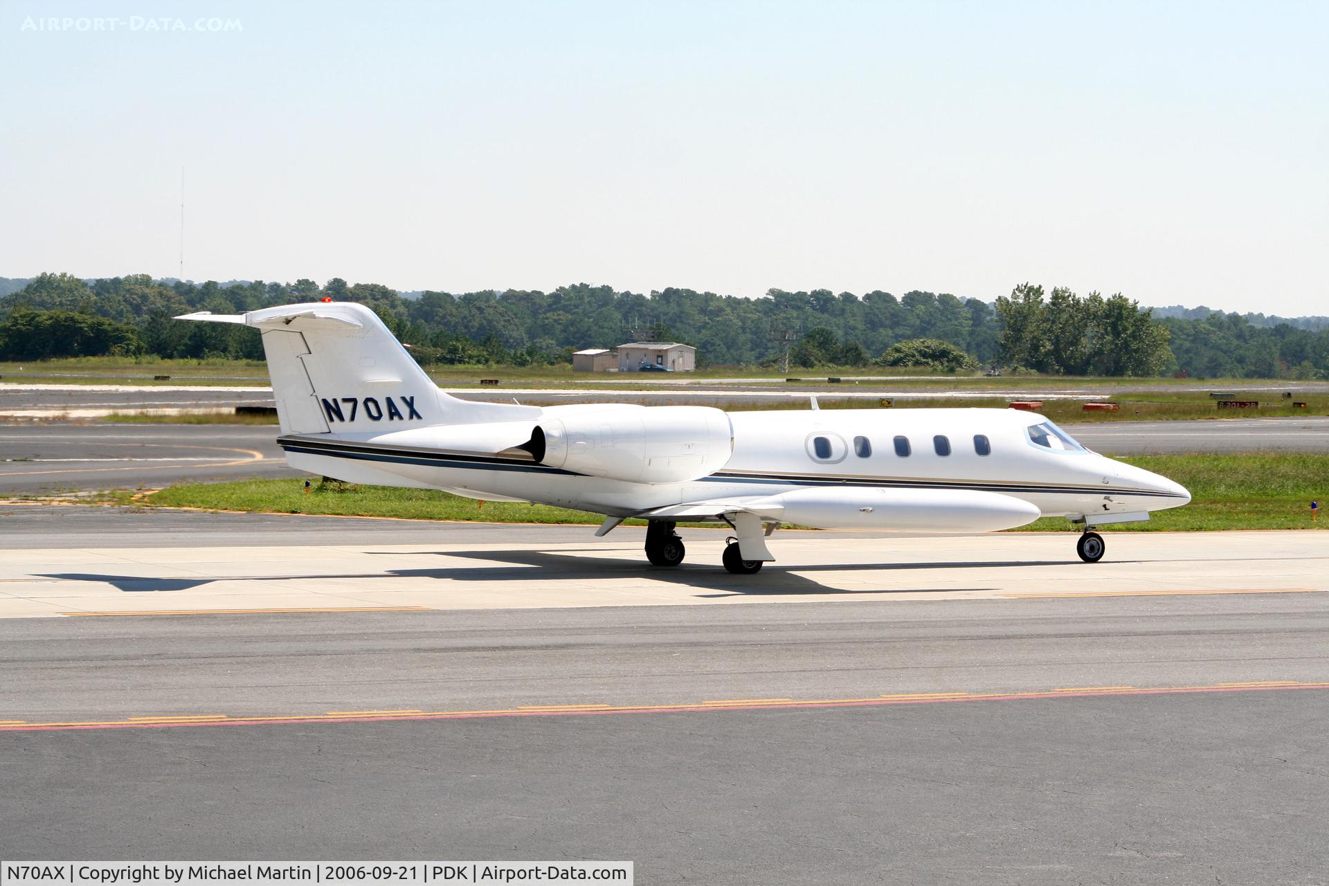 N70AX, 1977 Gates Learjet 35A C/N 155, Taxing to Runway 2R