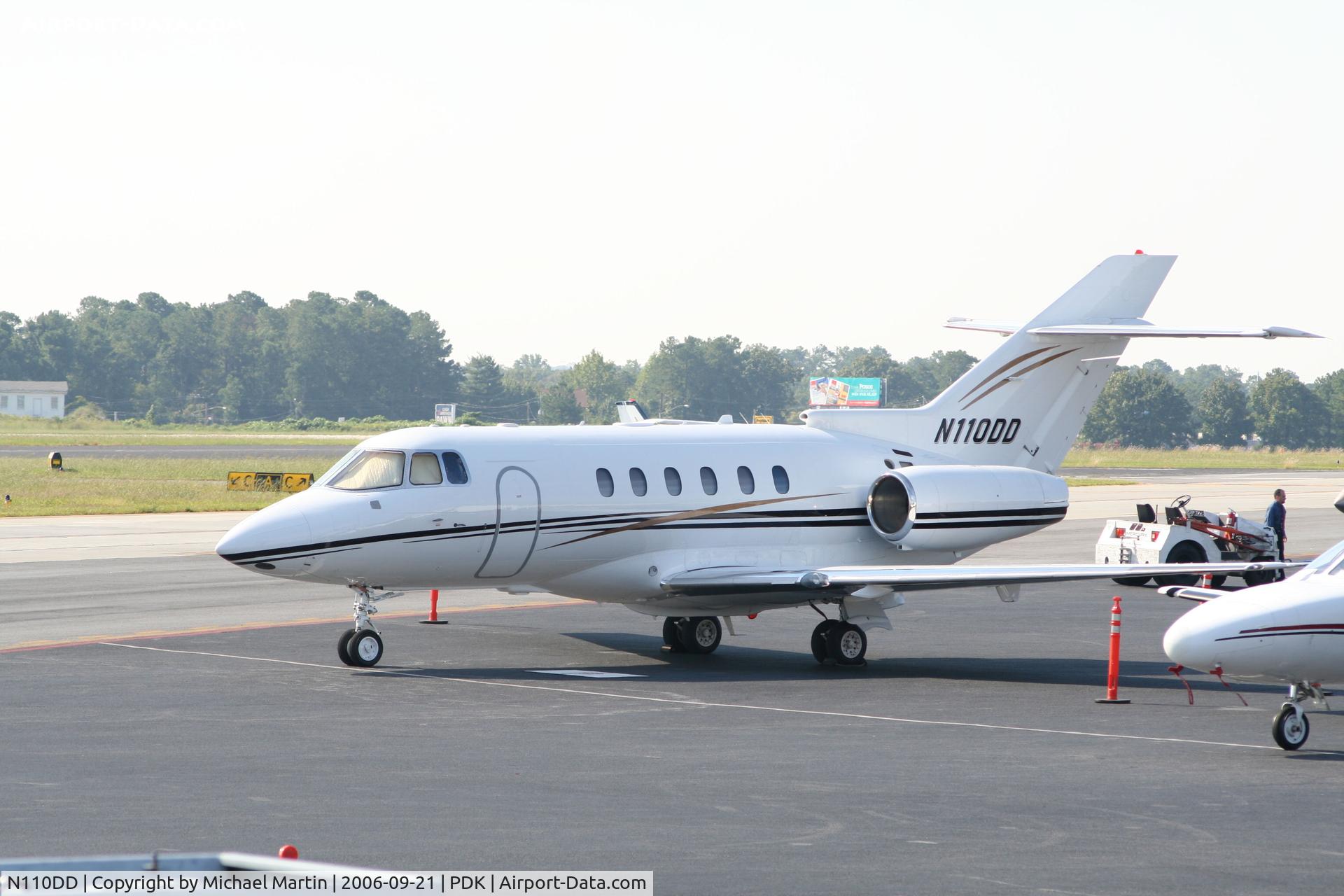 N110DD, 2005 Raytheon Hawker 800XP C/N 258728, Tied Down @ Mercury Air Center with other A/C