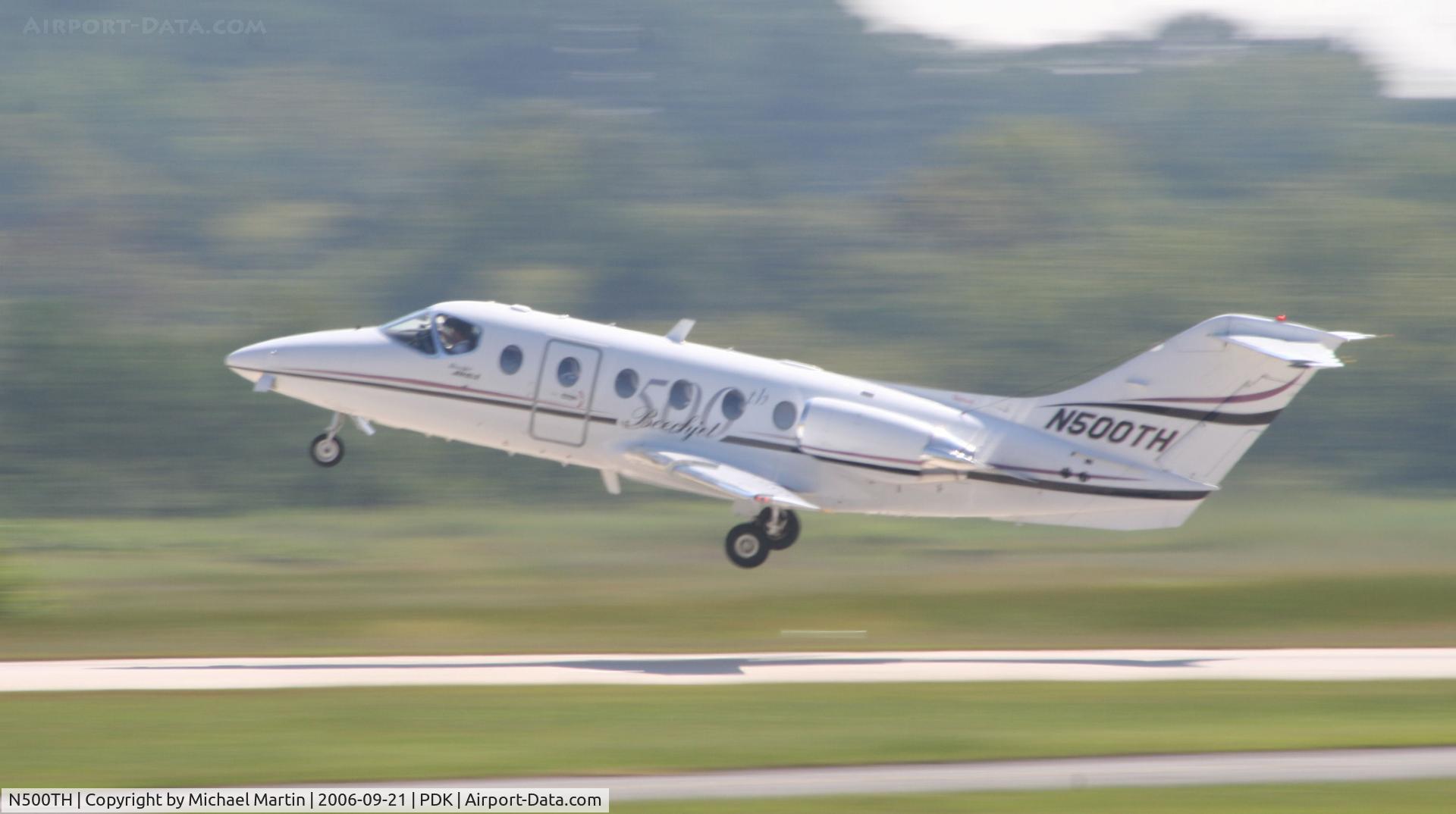 N500TH, 1999 Raytheon Aircraft Company 400A C/N RK-246, Departing PDK enroute to OPF
