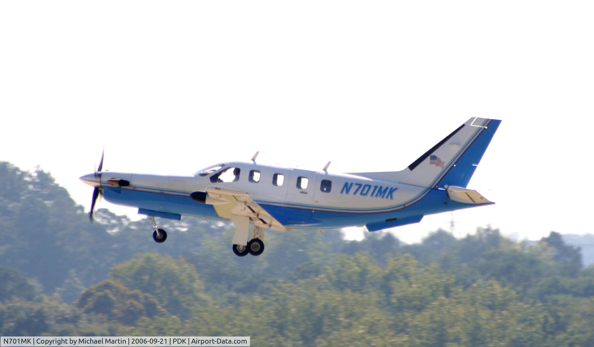 N701MK, 1997 Socata TBM-700 C/N 124, Departing PDK enroute to ABE