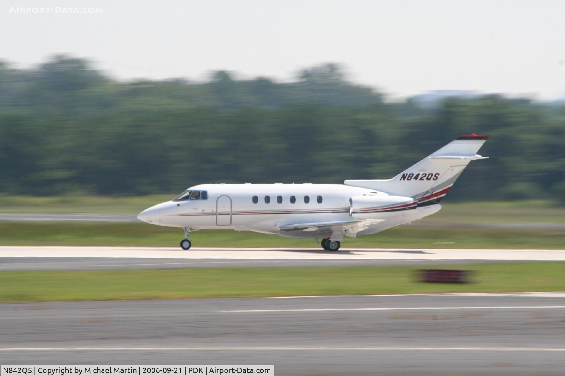 N842QS, 2001 Raytheon Hawker 800XP C/N 258542, Departing PDK enroute to CRQ