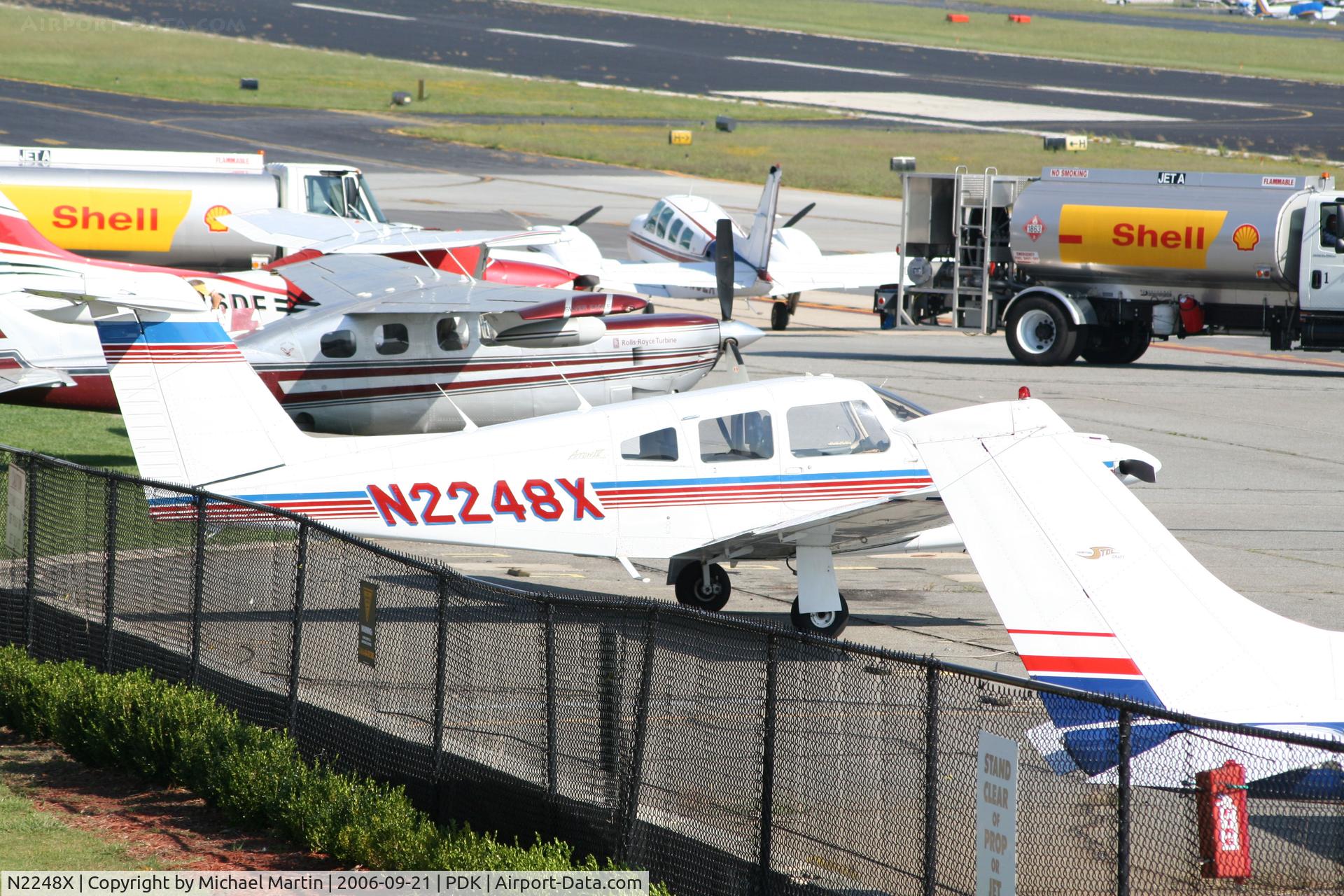 N2248X, 1979 Piper PA-28RT-201 Arrow IV C/N 28R-7918095, Tied down @ Epps with other aircraft