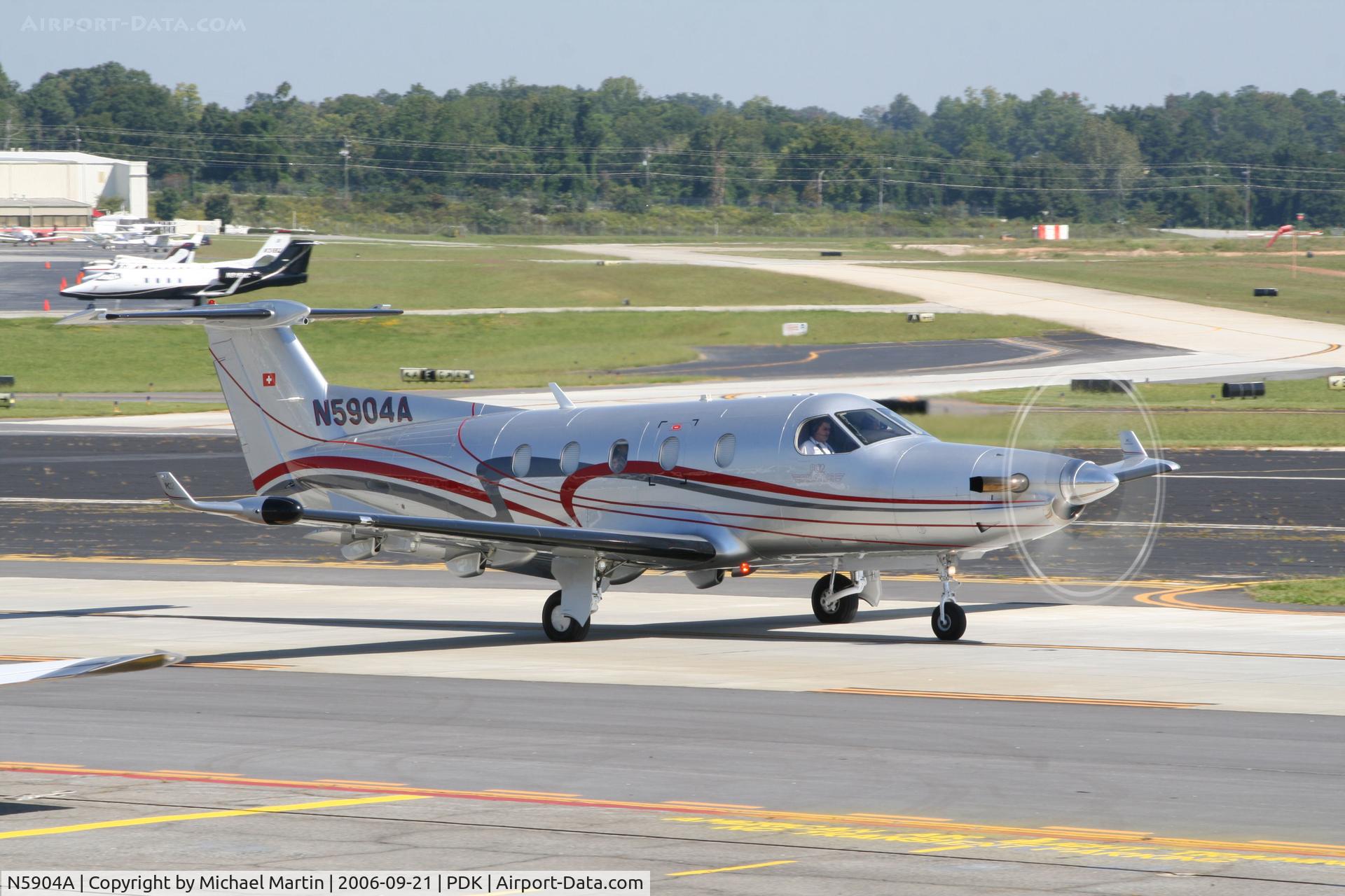 N5904A, 2004 Pilatus PC-12/45 C/N 583, Taxing from Epps Air Service