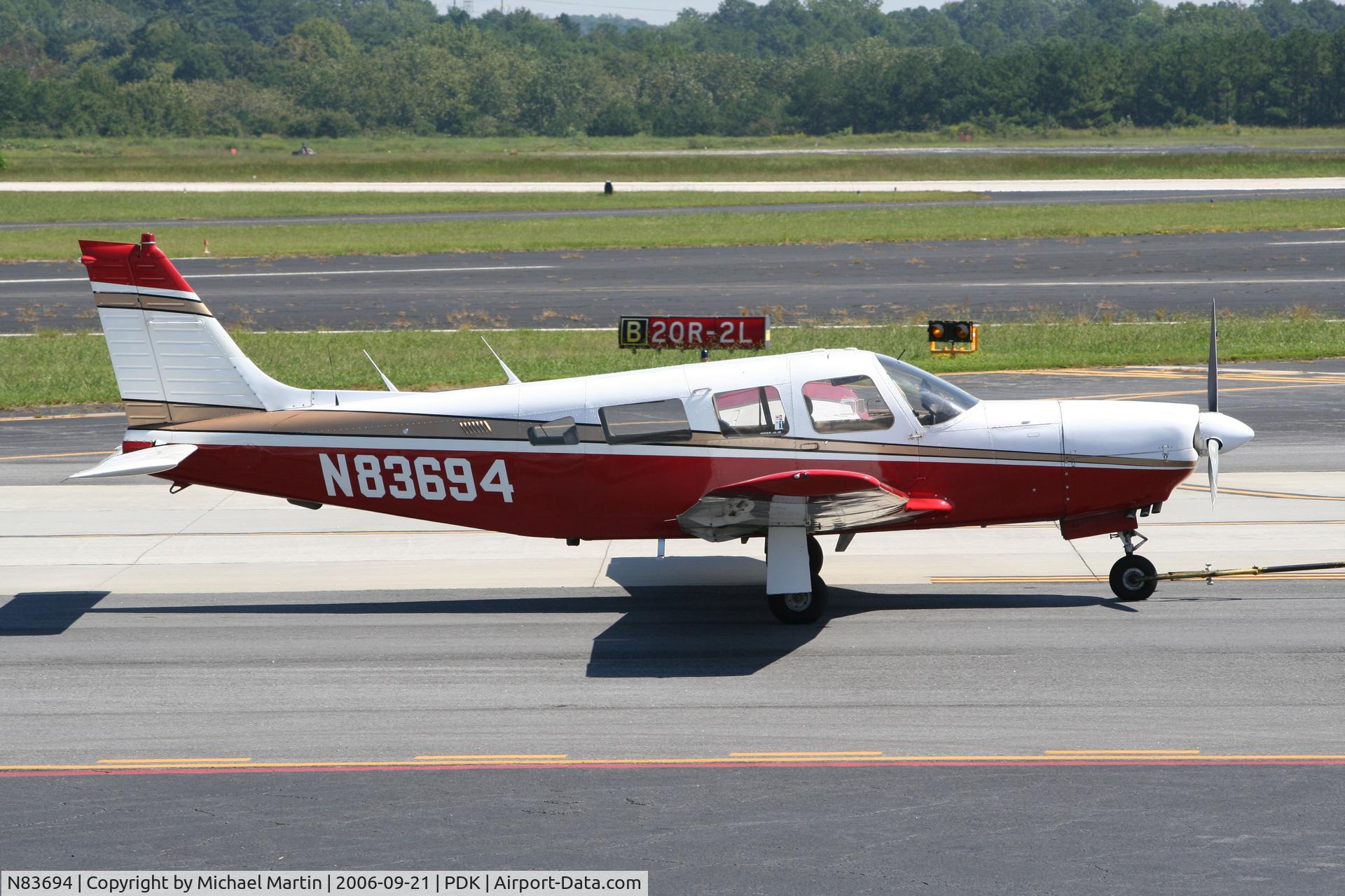 N83694, 1981 Piper PA-32R-301 Saratoga SP C/N 32R-8113060, Being towed to parking at Mercury Air Center