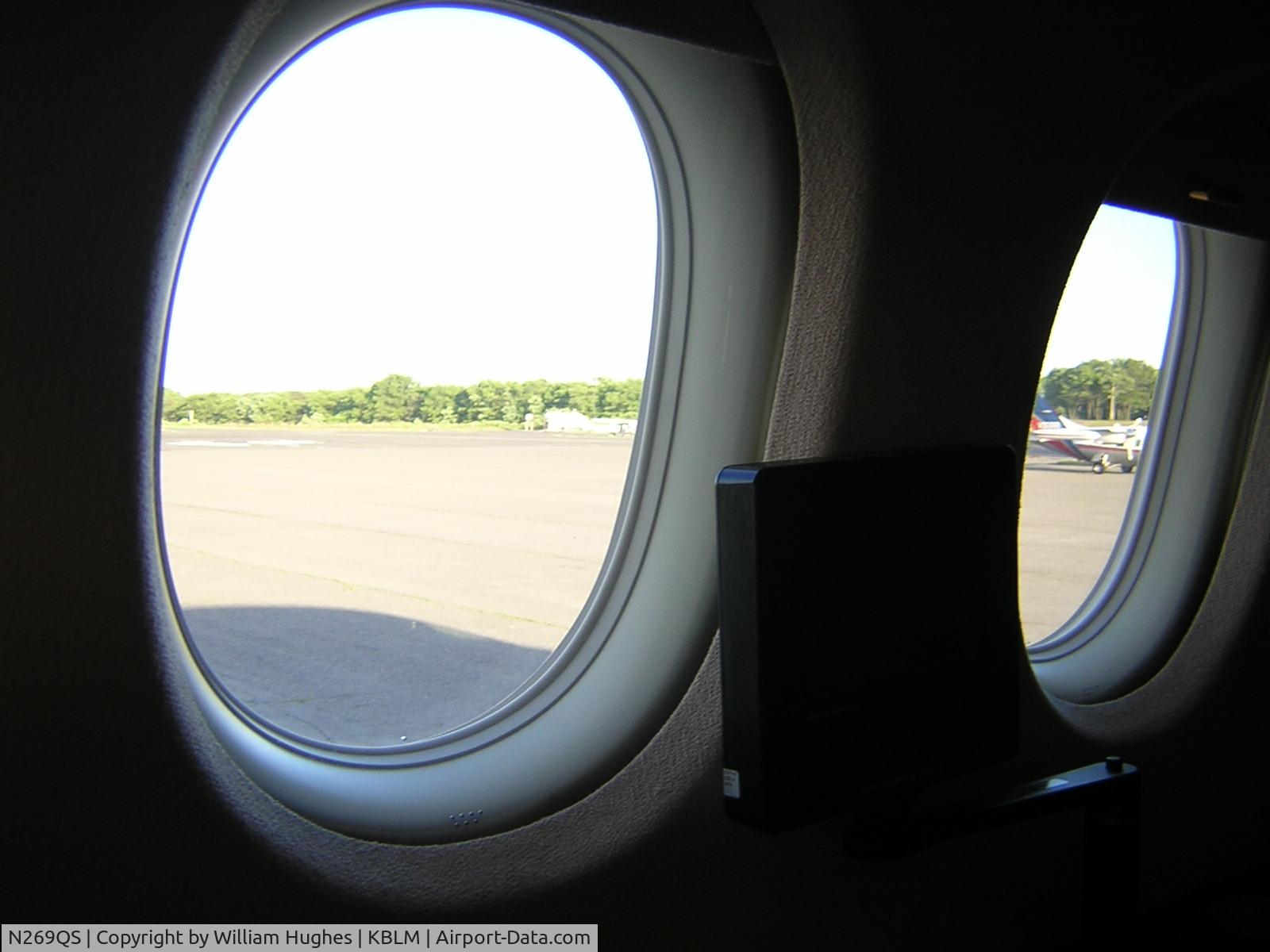 N269QS, 2002 Dassault Falcon 2000 C/N 169, looking out the window while taxing
