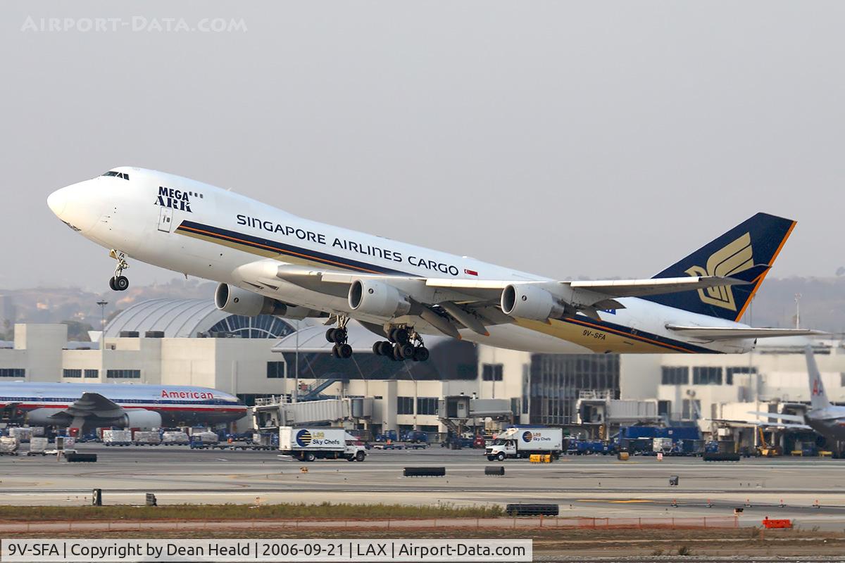 9V-SFA, Boeing 747-412F/SCD C/N 26563, Singapore Airlines Cargo 9V-SFA (FLT SQC7887) departing RWY 25R enroute to Shanghai Pudong (ZSPD) late in the afternoon.