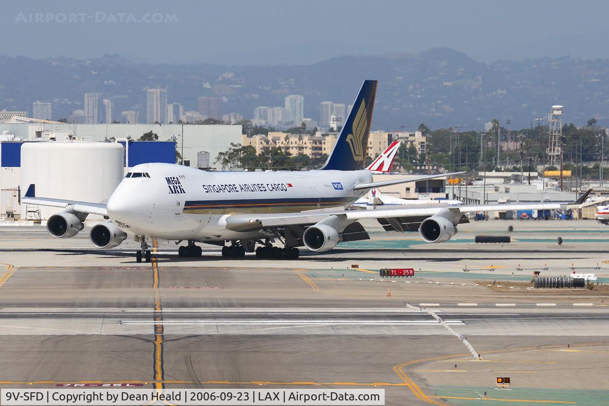 9V-SFD, 1995 Boeing 747-412F/SCD C/N 26553, Singapore Airlines Cargo 9V-SFD (FLT SQC7884) crossing RWY 25L after arrival from Ted Stevens Anchorage Int'l (PANC).