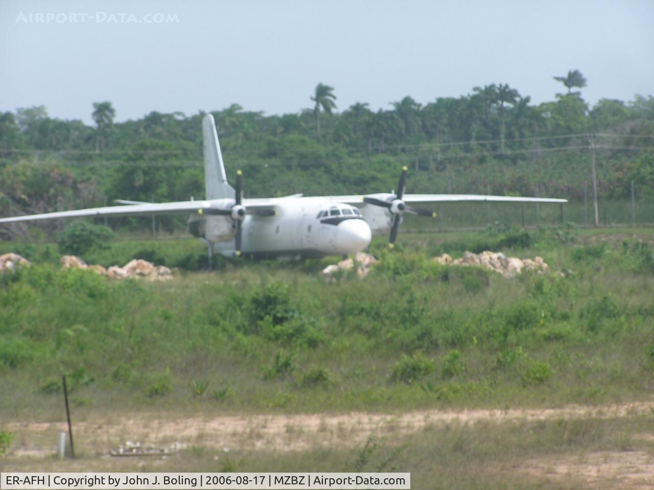 ER-AFH, 1976 Antonov An-26B C/N 3901, AN-24 in the weeds at Belize