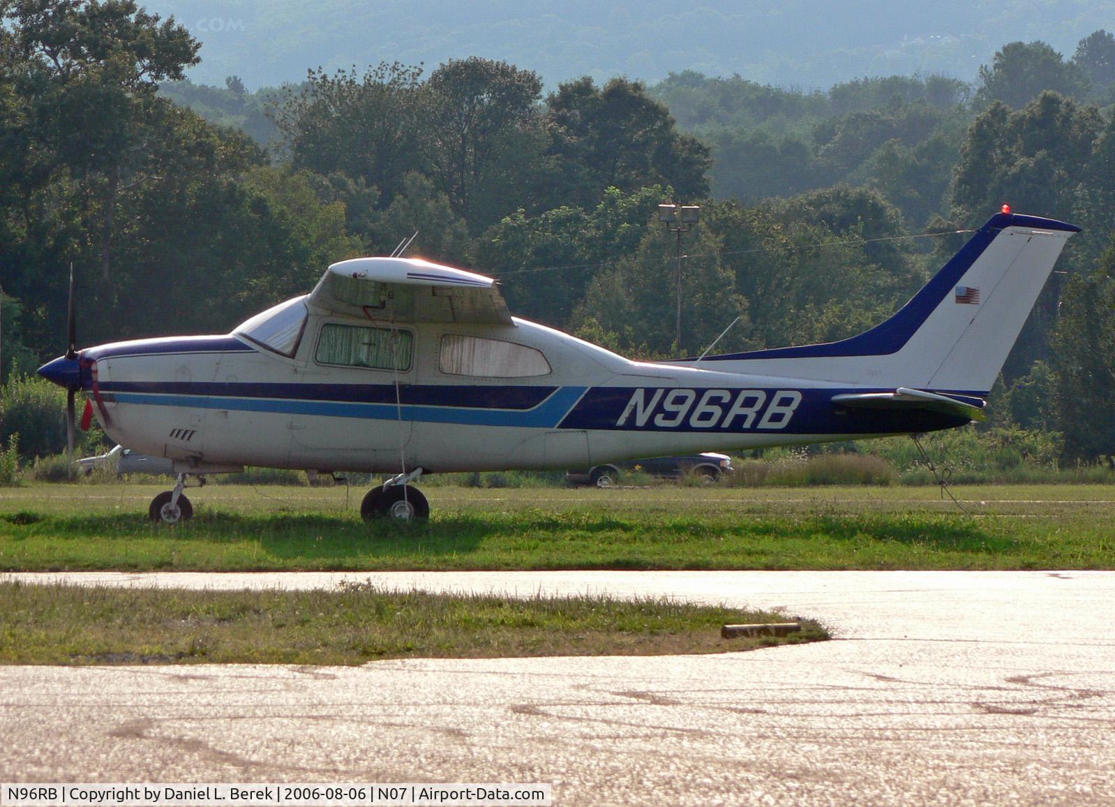 N96RB, Cessna T210M Turbo Centurion C/N 21062250, Circa 1977 Cessna Centurion relaxes at its home base on a sultry summer evening.