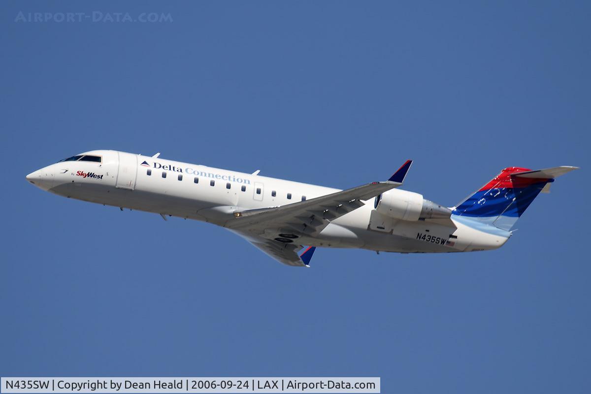 N435SW, 2001 Bombardier CRJ-200LR (CL-600-2B19) C/N 7555, Delta Connection (operated by SkyWest) N435SW (FLT SKW3859) climbing out from RWY 25R enroute to Salt Lake City Int'l (KSLC).
