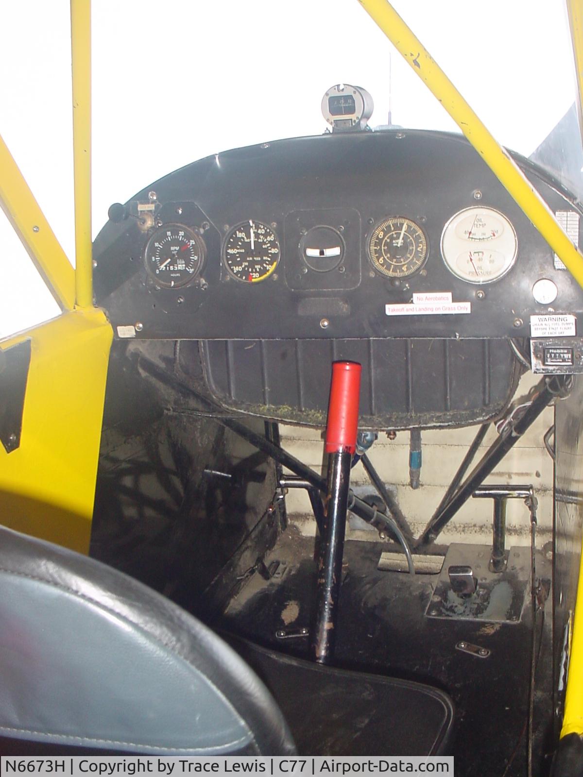 N6673H, 1946 Piper J3C-65 Cub C/N 19877, Resting in her hangar @ C77