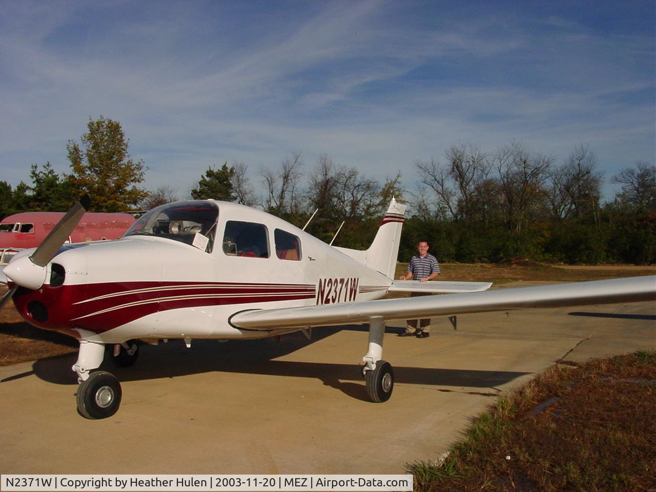 N2371W, 1966 Beech A23-19 C/N MB-9, Chris Hulen preflighting the airplane in Mena, AR, after repaint.