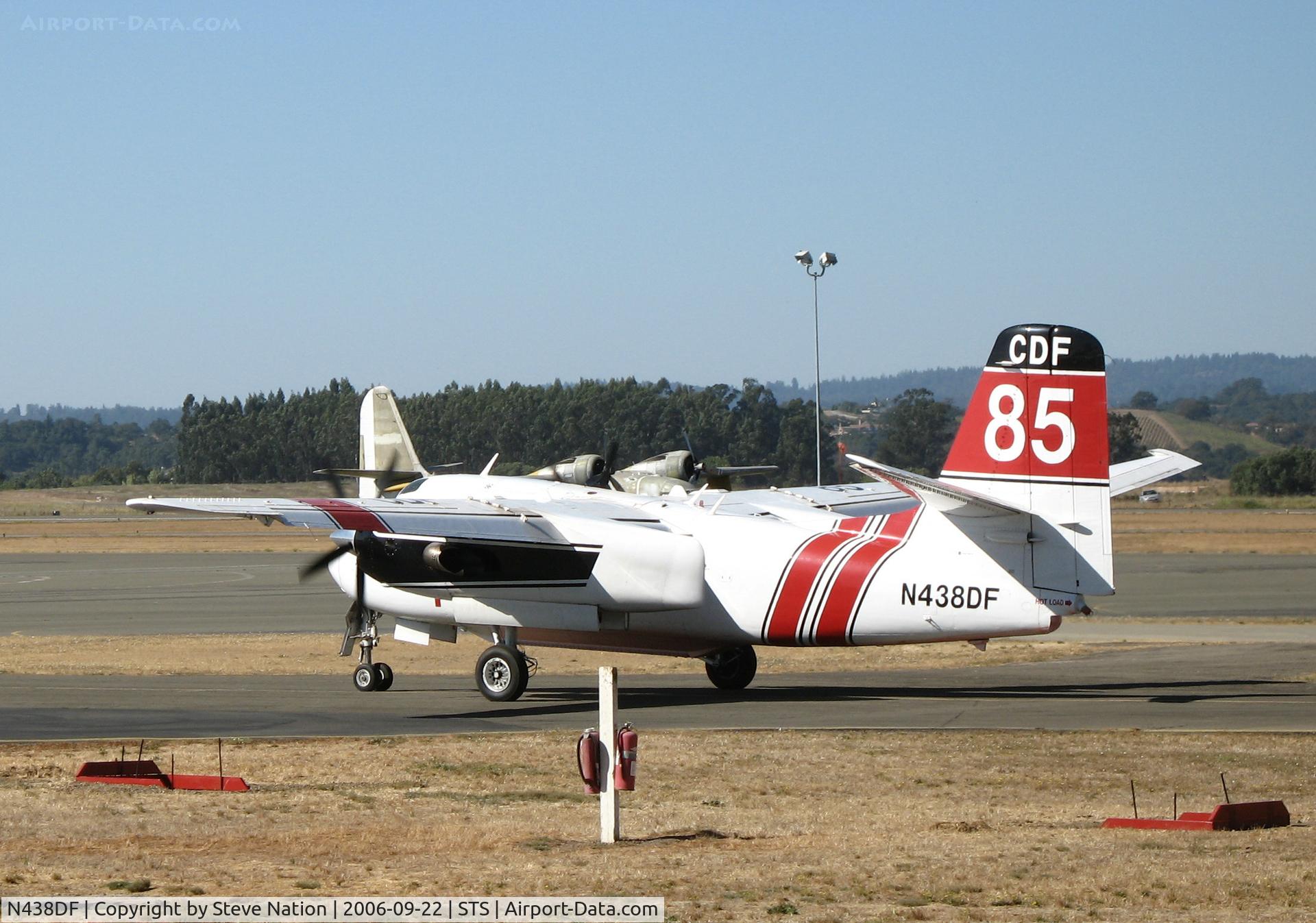 N438DF, Marsh Aviation S-2F3AT C/N 151640, Santa Rosa-based CDF S-2T Tanker #85 with relief pilot Bill Buckley at the controls leaving the Sonoma County Airport, CA air attack base with load of retardent
