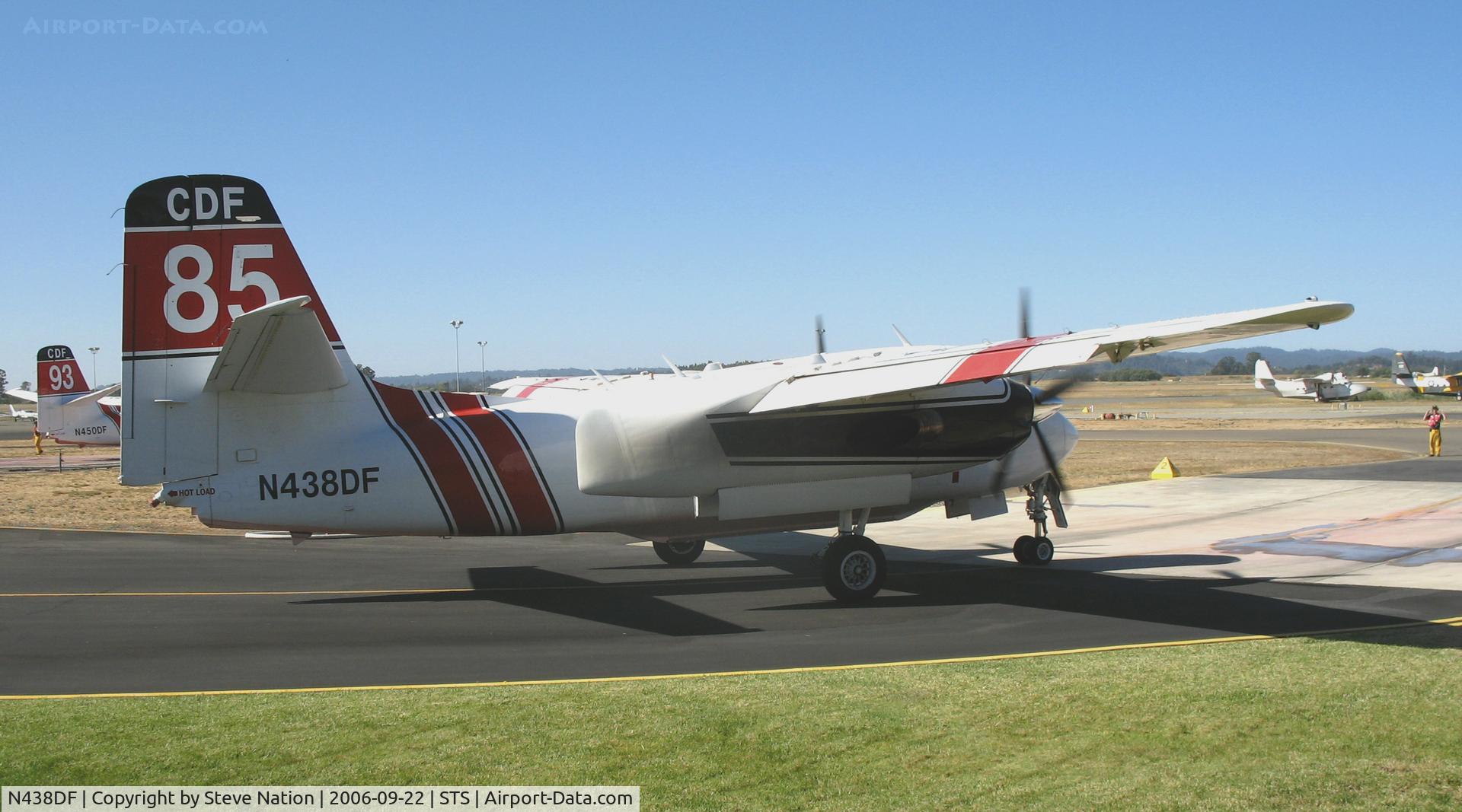 N438DF, Marsh Aviation S-2F3AT C/N 151640, Santa Rosa-based CDF S-2T Tanker #85 with relief pilot Bill Buckley at the controls taxys onto to loading pad at Sonoma County Airport, CA air attack base
