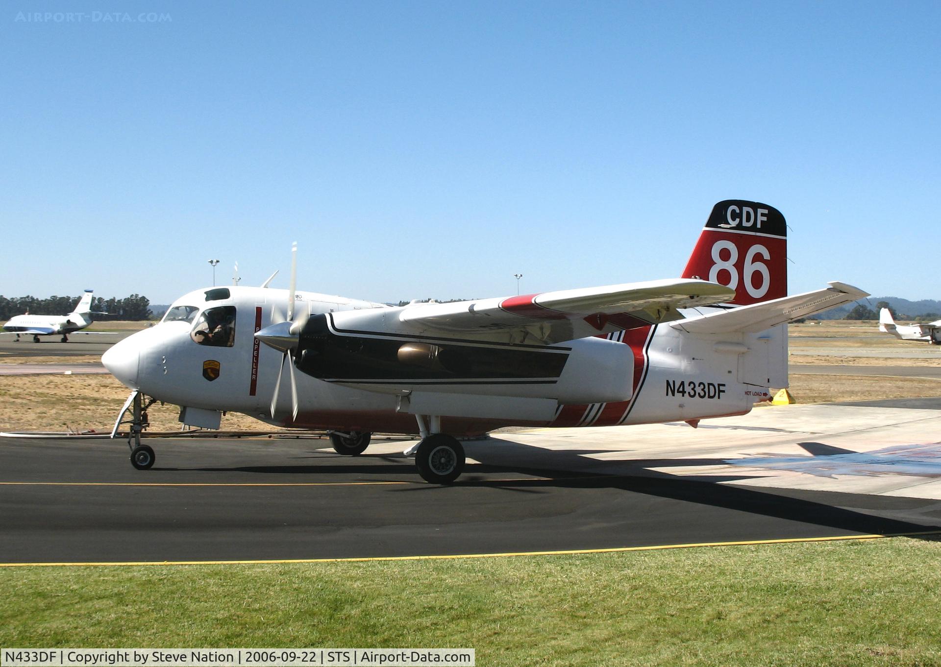 N433DF, Marsh Aviation S-2F3AT C/N 149855, Santa Rosa-based CDF S-2T Tanker #86 with Bob Valette at the controls taxying in to air attack base at Sonoma County Airport, CA following firefighting mission