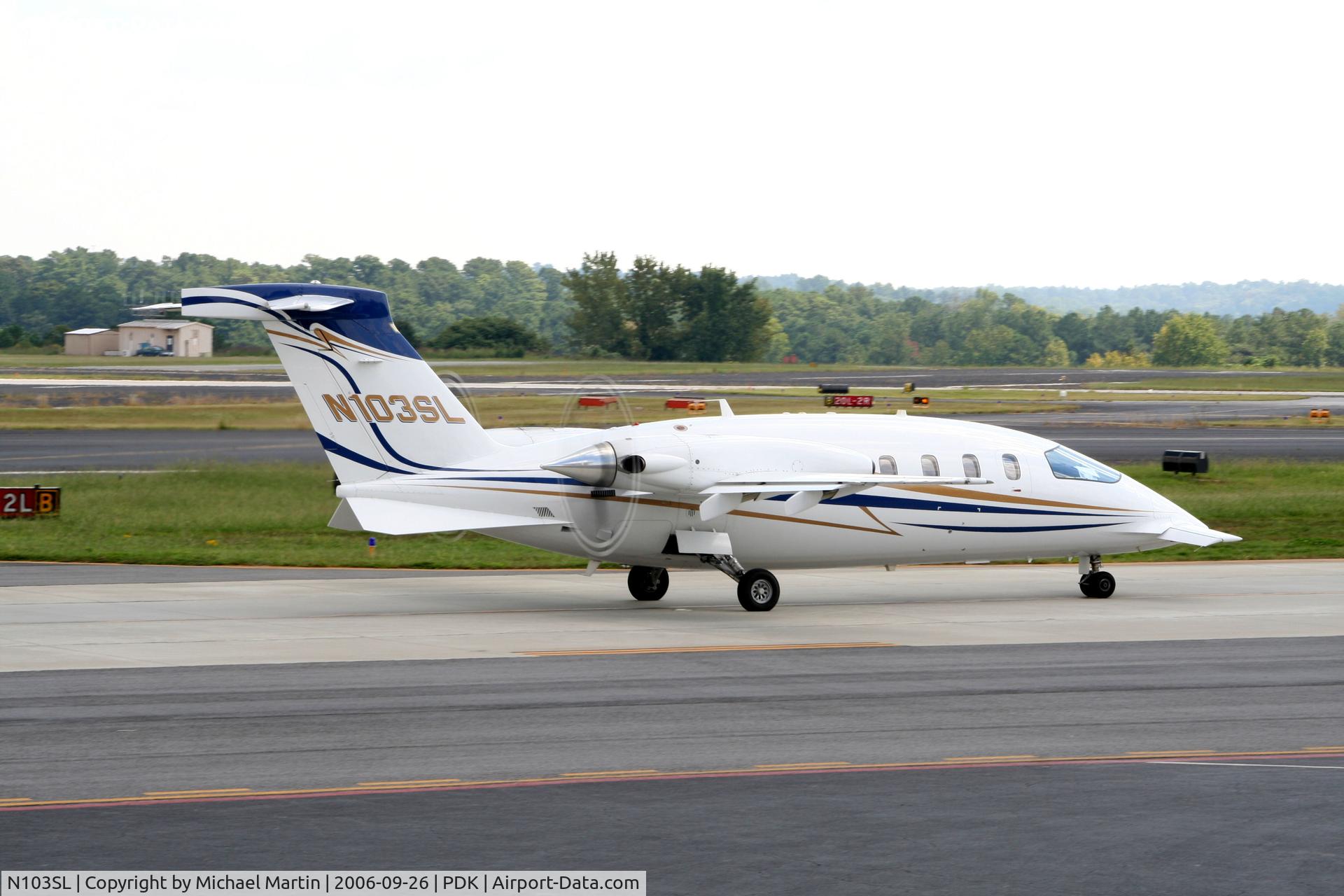N103SL, 2002 Piaggio P-180 Avanti C/N 1059, Taxing to Runway 2R