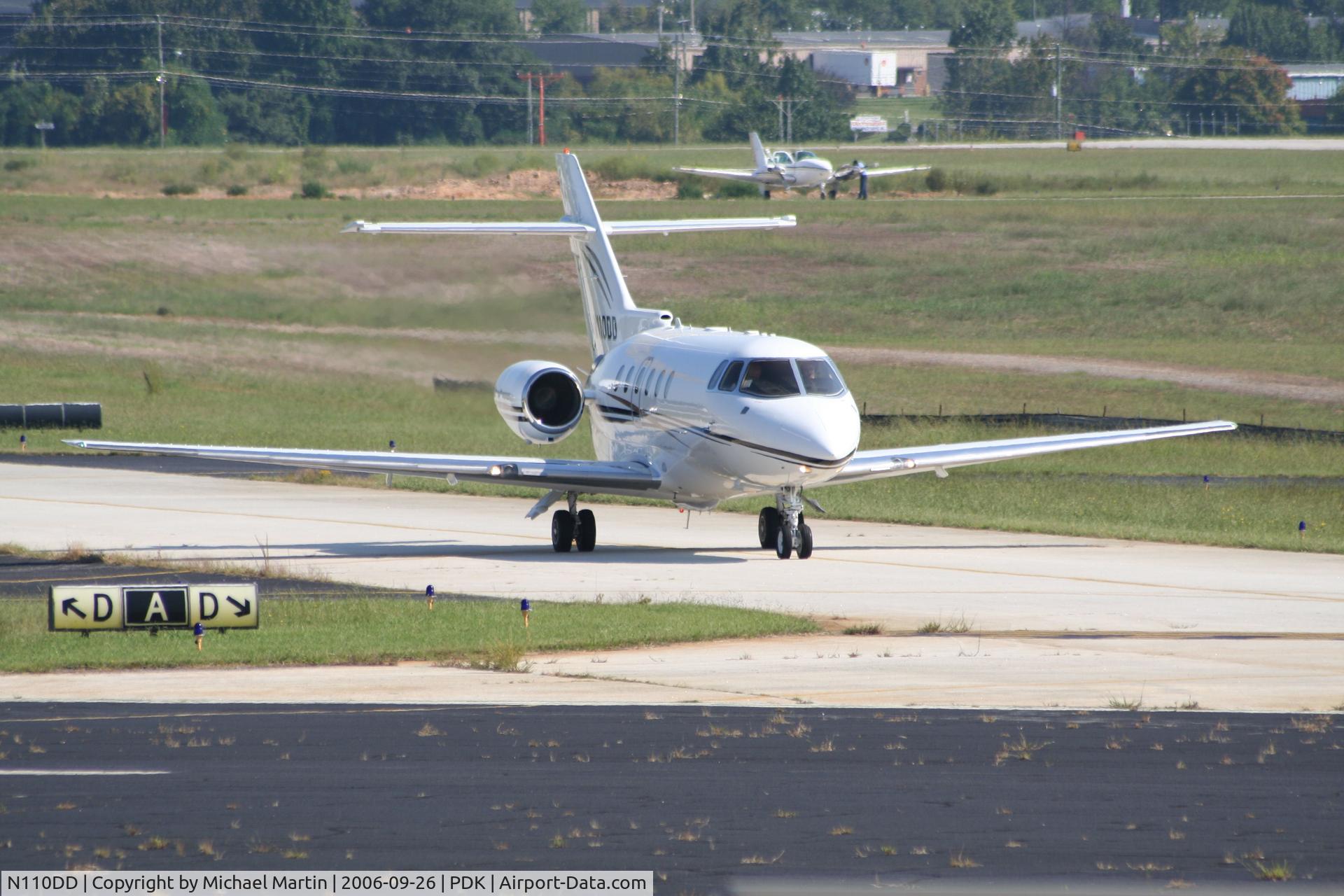 N110DD, 2005 Raytheon Hawker 800XP C/N 258728, Taxing to Mercury Air Center