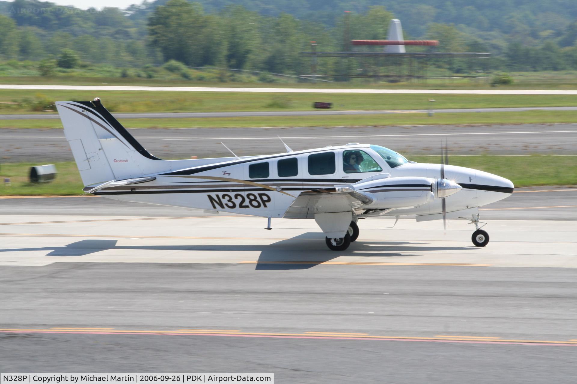 N328P, 1999 Raytheon Aircraft Company 58 C/N TH-1916, Taxing to Runway 2R