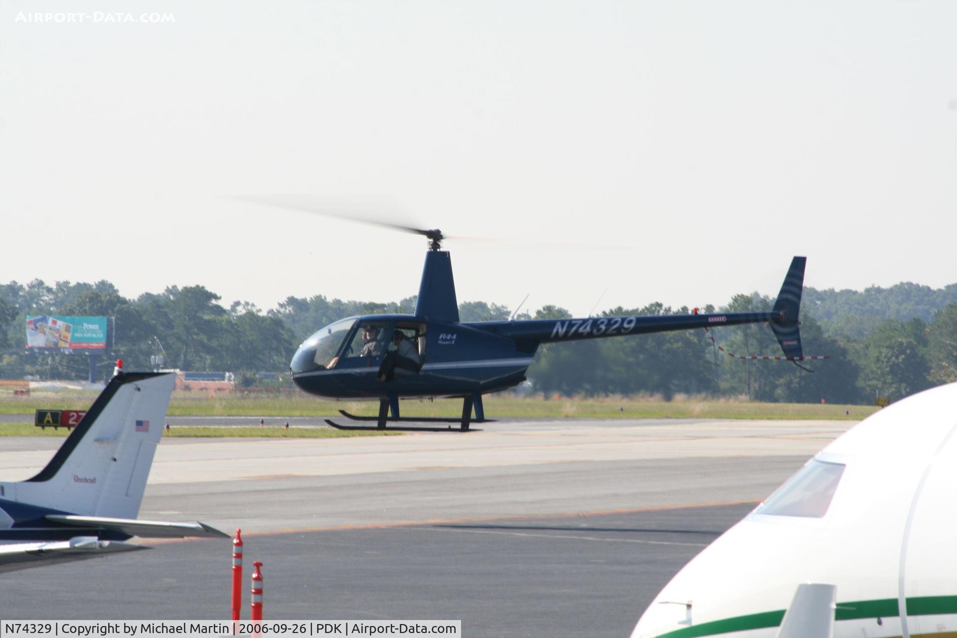 N74329, 2004 Robinson R44 II C/N 10560, Departing Mercury Air Center