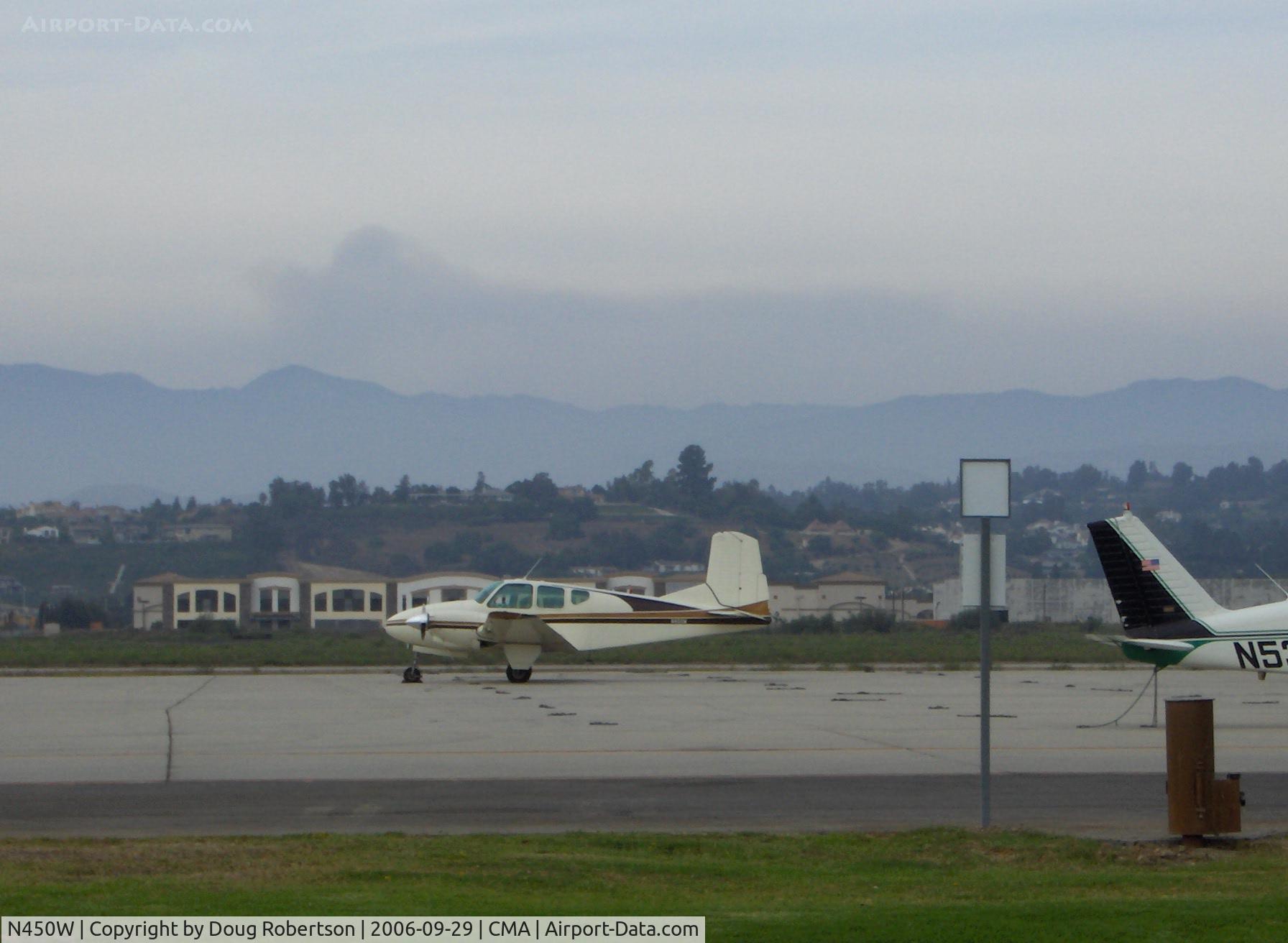N450W, 1958 Beech 95 C/N TD-87, 1958 Beech 95 TRAVEL AIR, two Lycoming O&VO-360 180 Hp, Mountains fire and smoke in background