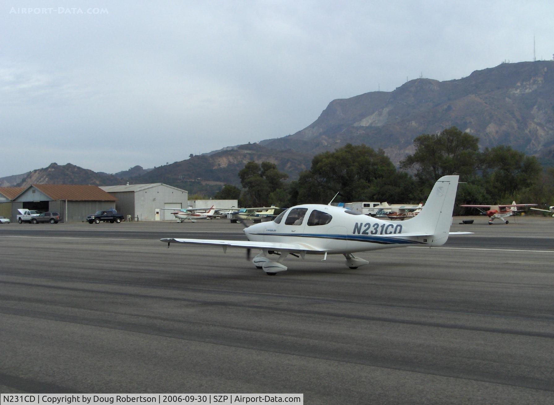 N231CD, 2001 Cirrus SR20 C/N 1125, 2001 Cirrus Design SR-20, Continental IO-360-ES 200 Hp, taxi to Runway 22 after refueling