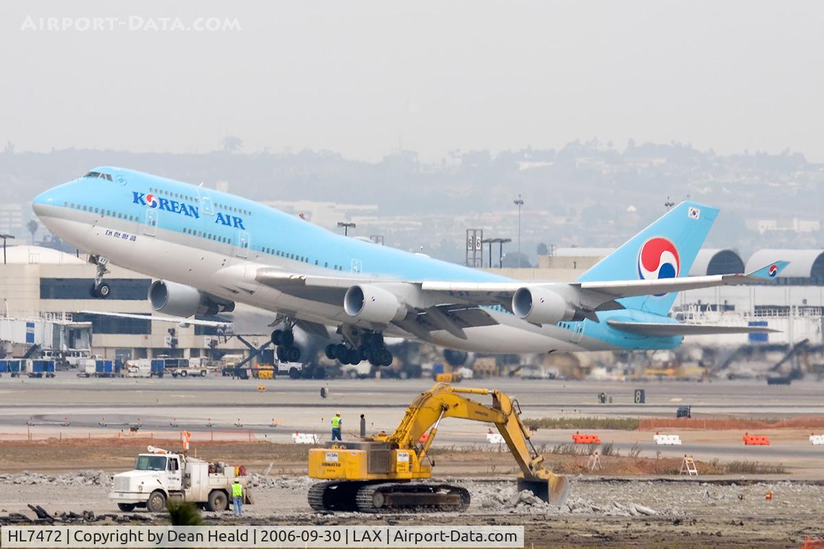 HL7472, 1996 Boeing 747-4B5 C/N 26403, Korean Air HL7472 (FLT KAL18) departing RWY 25R enroute to Incheon Int'l (RKSI) as work crews continue work on RWY 25L in the foreground.