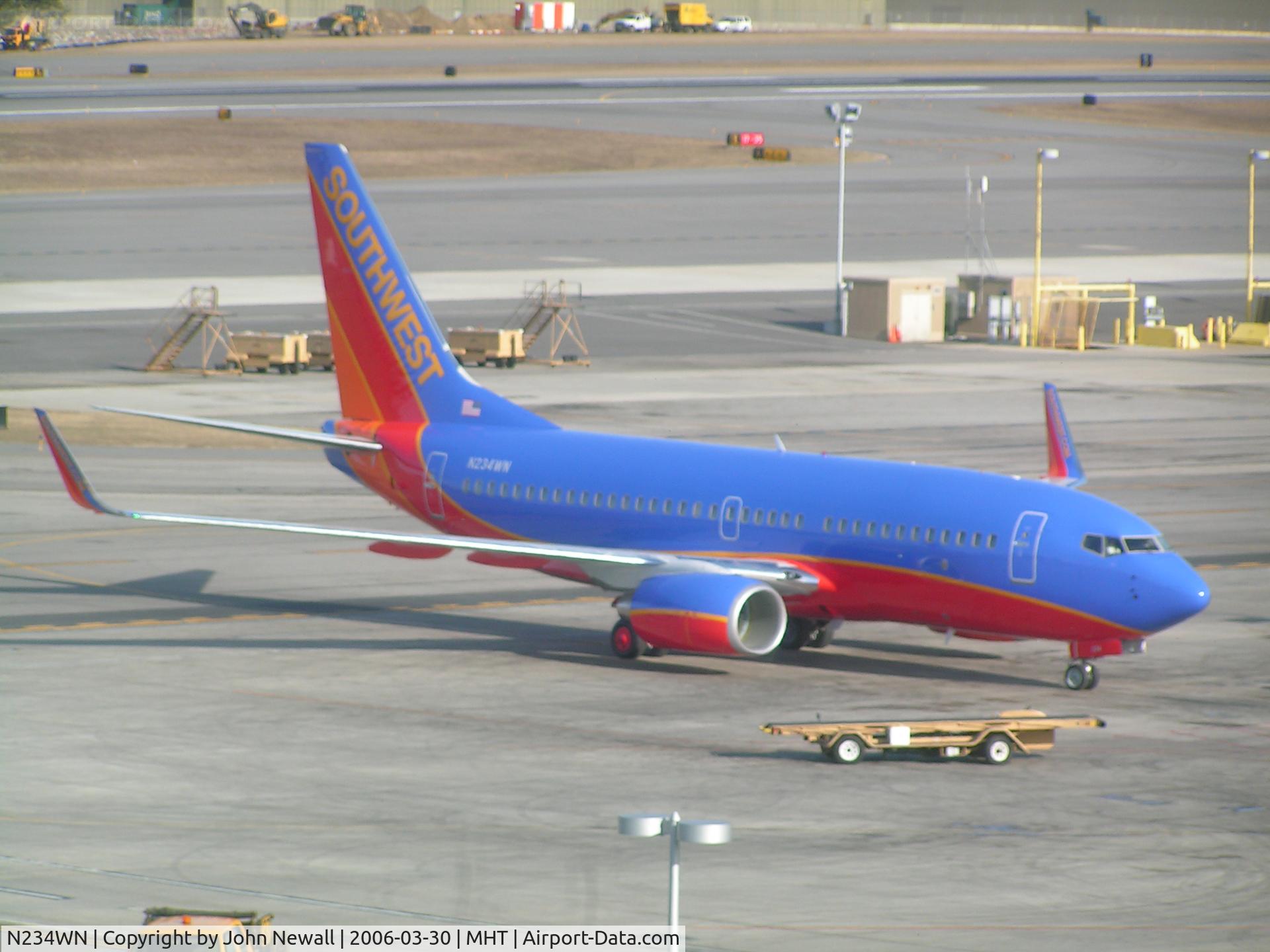 N234WN, 2006 Boeing 737-7H4 C/N 32502, Taken at MHT on 03/30/06, delivery date I believe 03/28/06