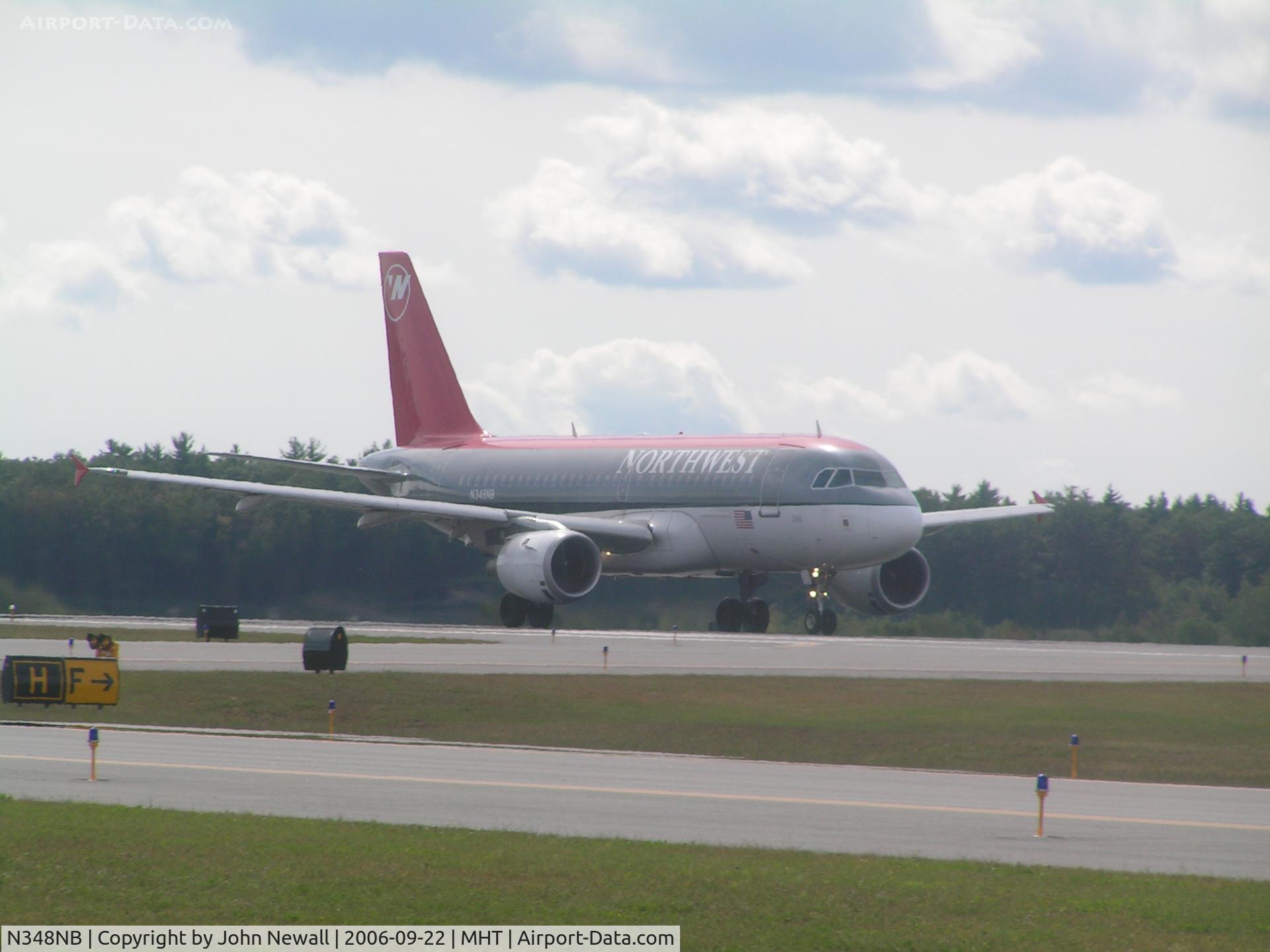 N348NB, 2002 Airbus A319-114 C/N 1810, take off shot from 1930s terminal parking lot. Terminal converted to a museum.