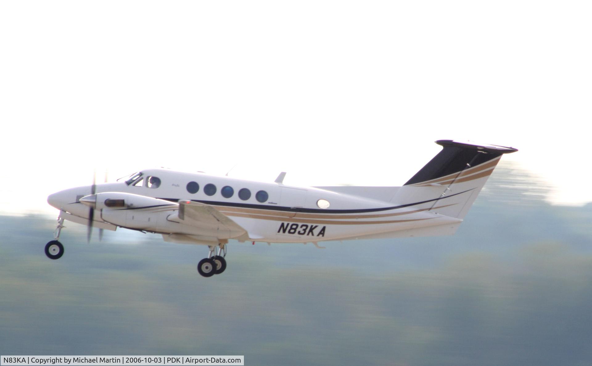 N83KA, 1983 Beech B200 King Air C/N BB-1111, Departing PDK enroute to CHA