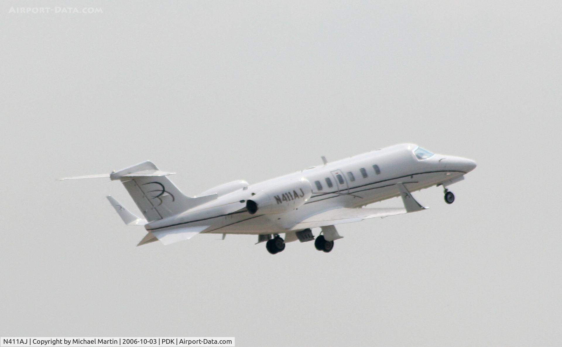 N411AJ, 2004 Learjet 40 C/N 40-2011, Departing PDK enroute to TLH