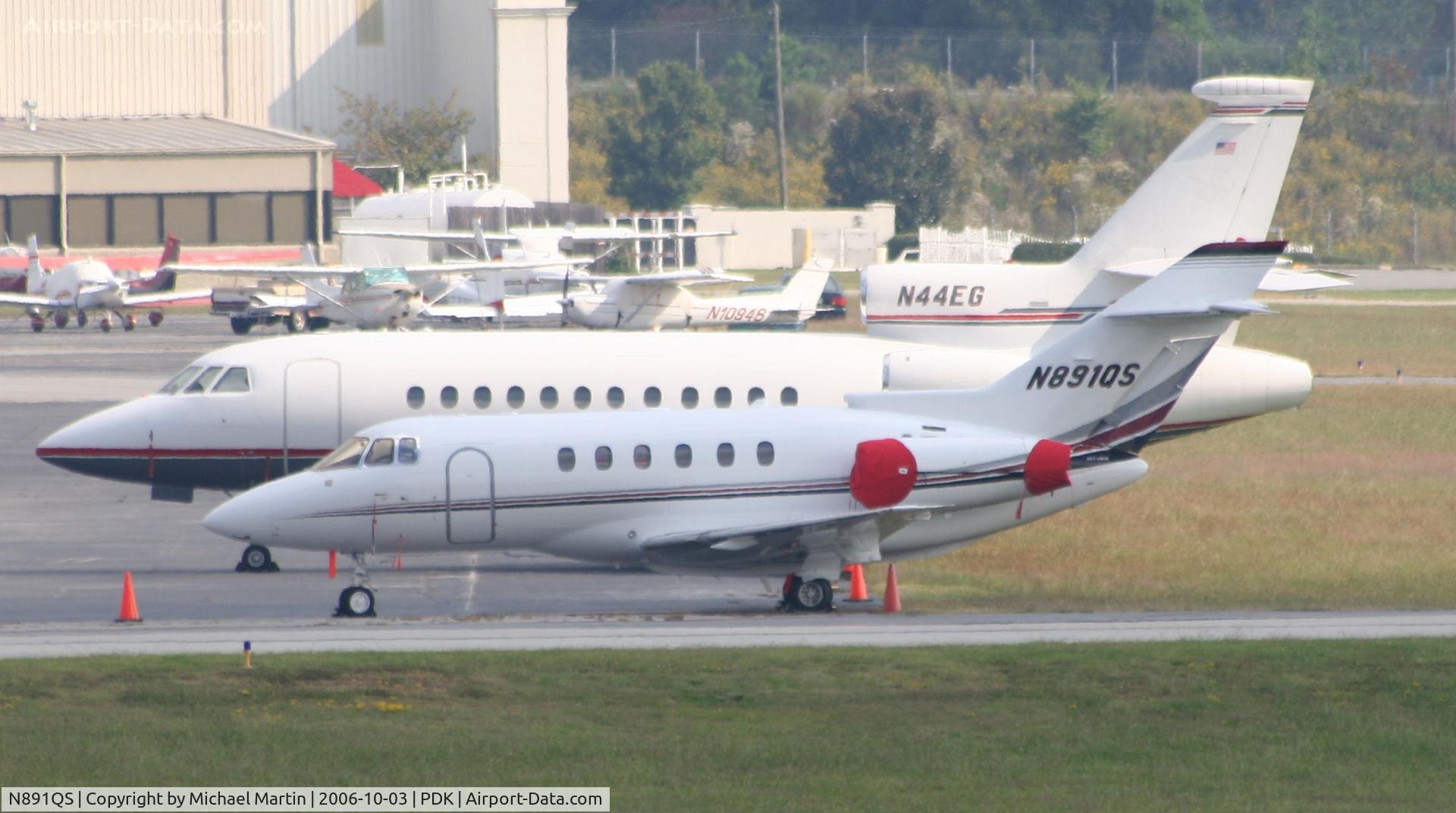 N891QS, 2006 Raytheon Hawker 800XP C/N 258788, Tied down @ Signature Flight Support