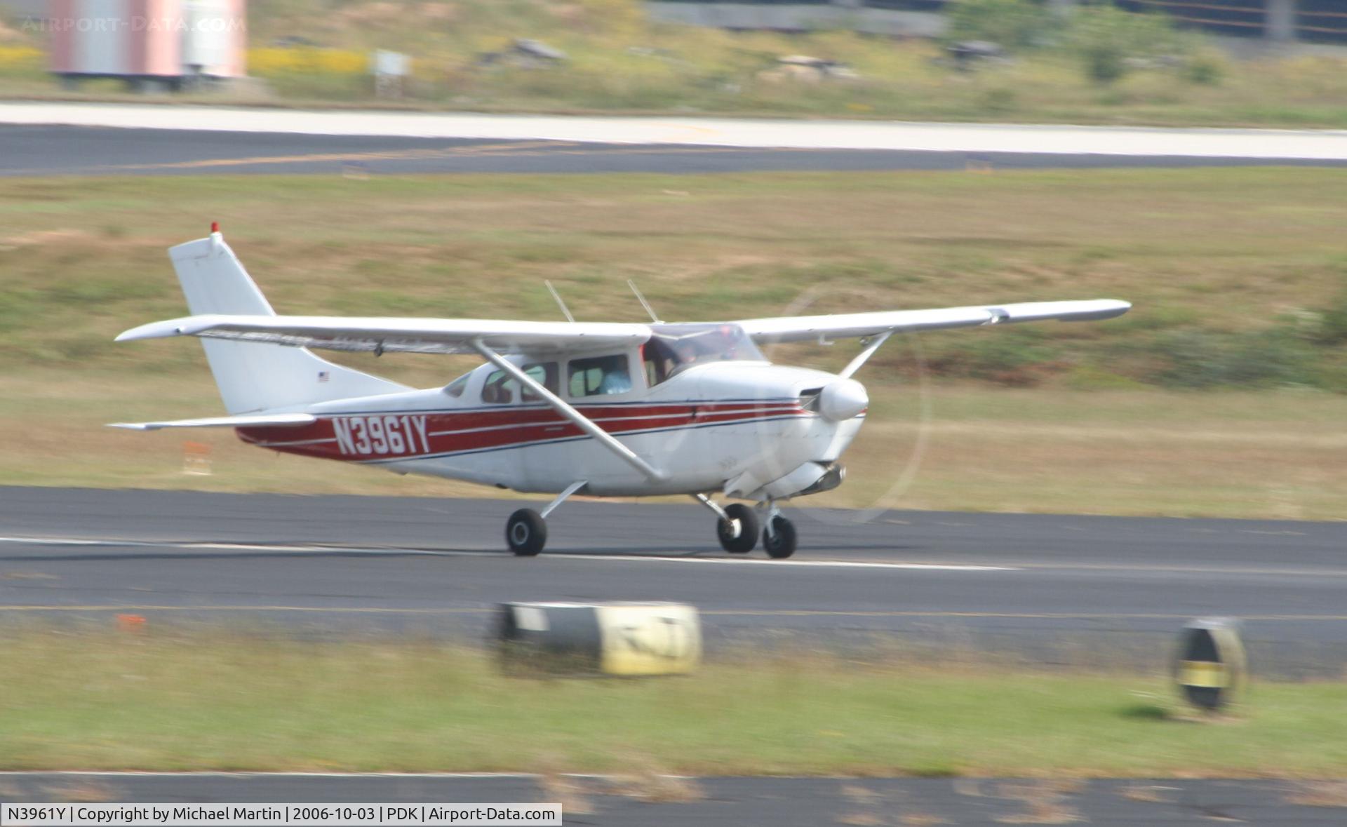 N3961Y, 1964 Cessna 210D Centurion C/N 21058461, Taking off from Runway 20R