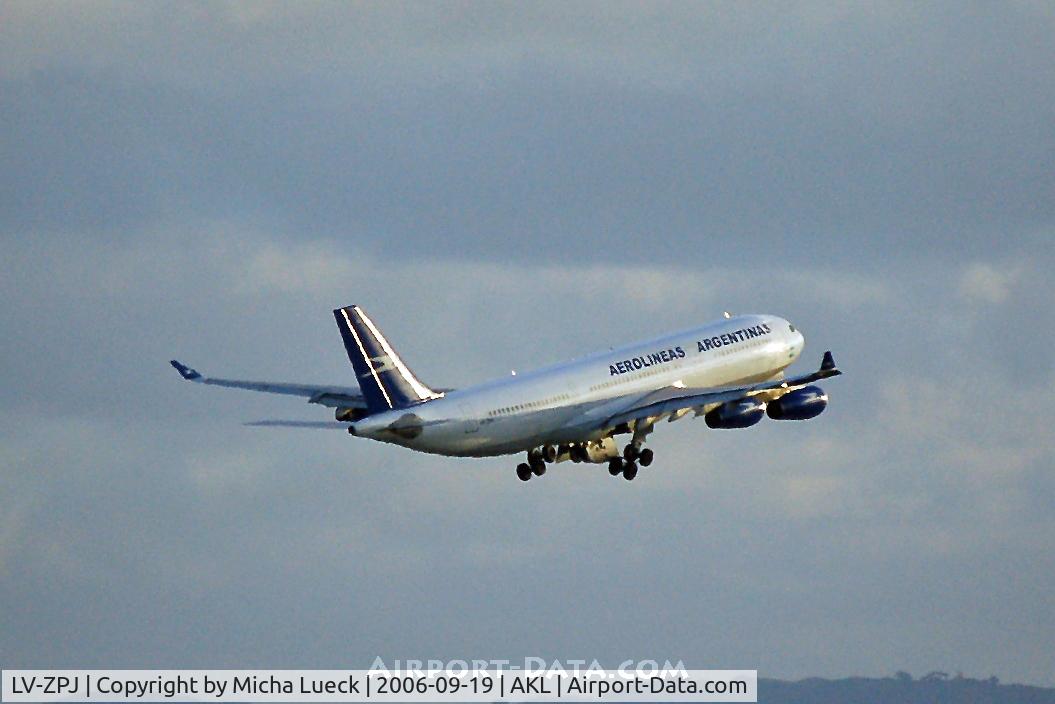LV-ZPJ, 1994 Airbus A340-211 C/N 074, taking off into Auckland's evening sky